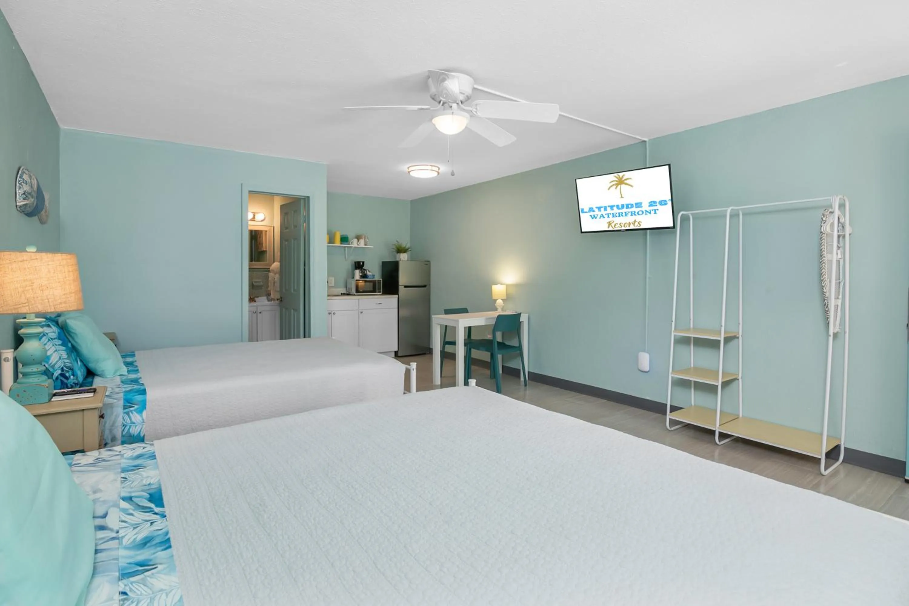 Photo of the whole room, Bed in Latitude 26 Waterfront Boutique Resort - Fort Myers Beach