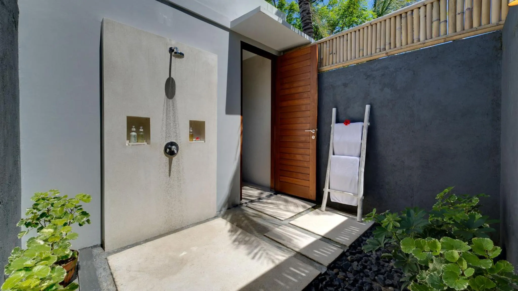 Shower in Malimbu Cliff Villa by Elite Havens