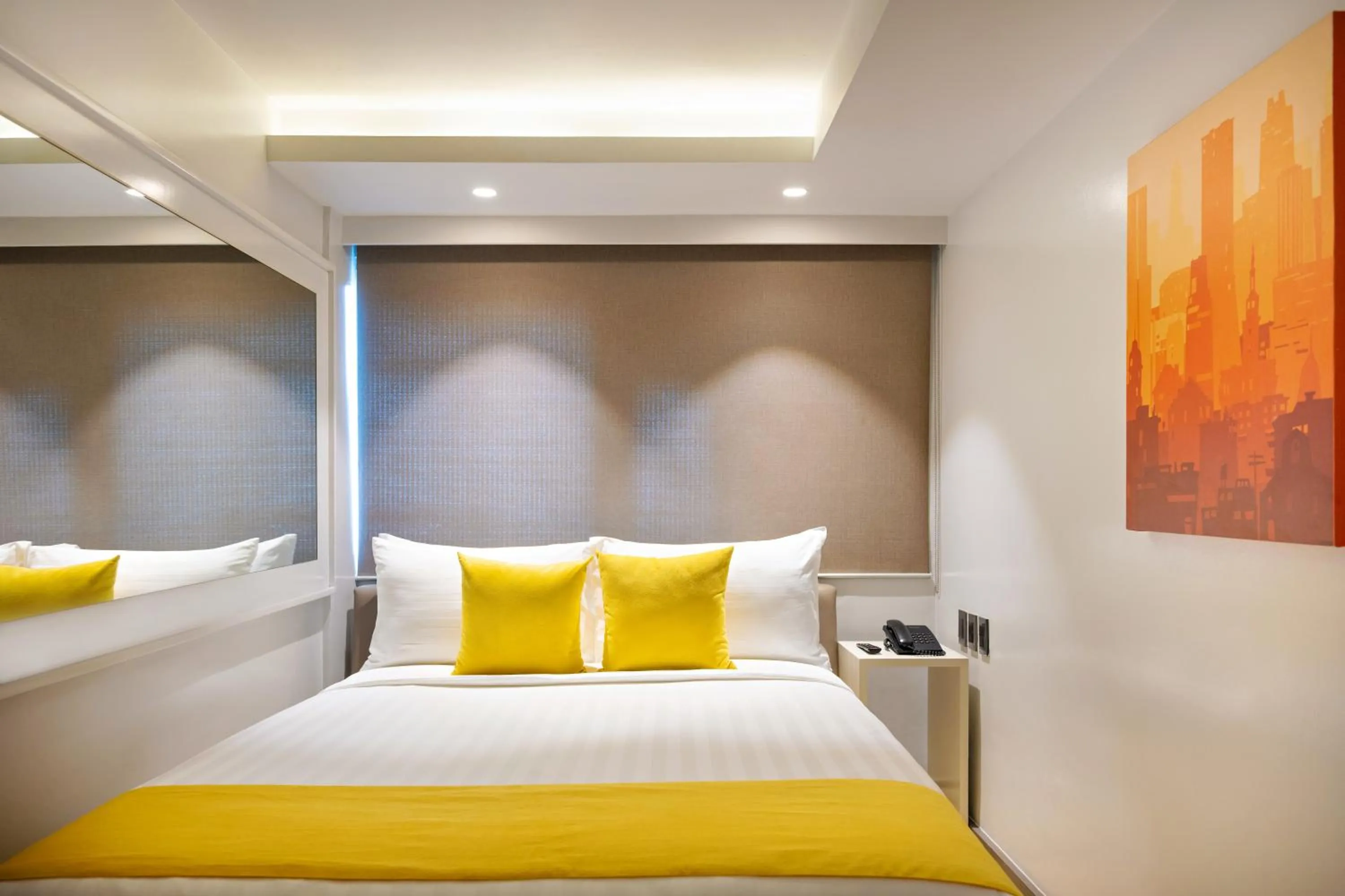 Bed in The Mini Suites Eton Tower Makati