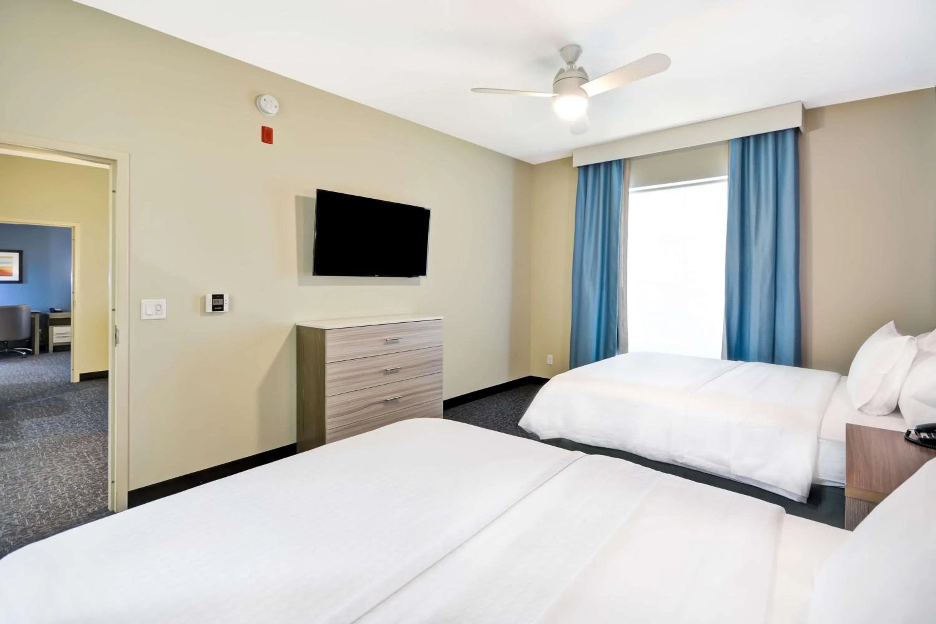 Bed in Homewood Suites by Hilton Orlando Theme Parks