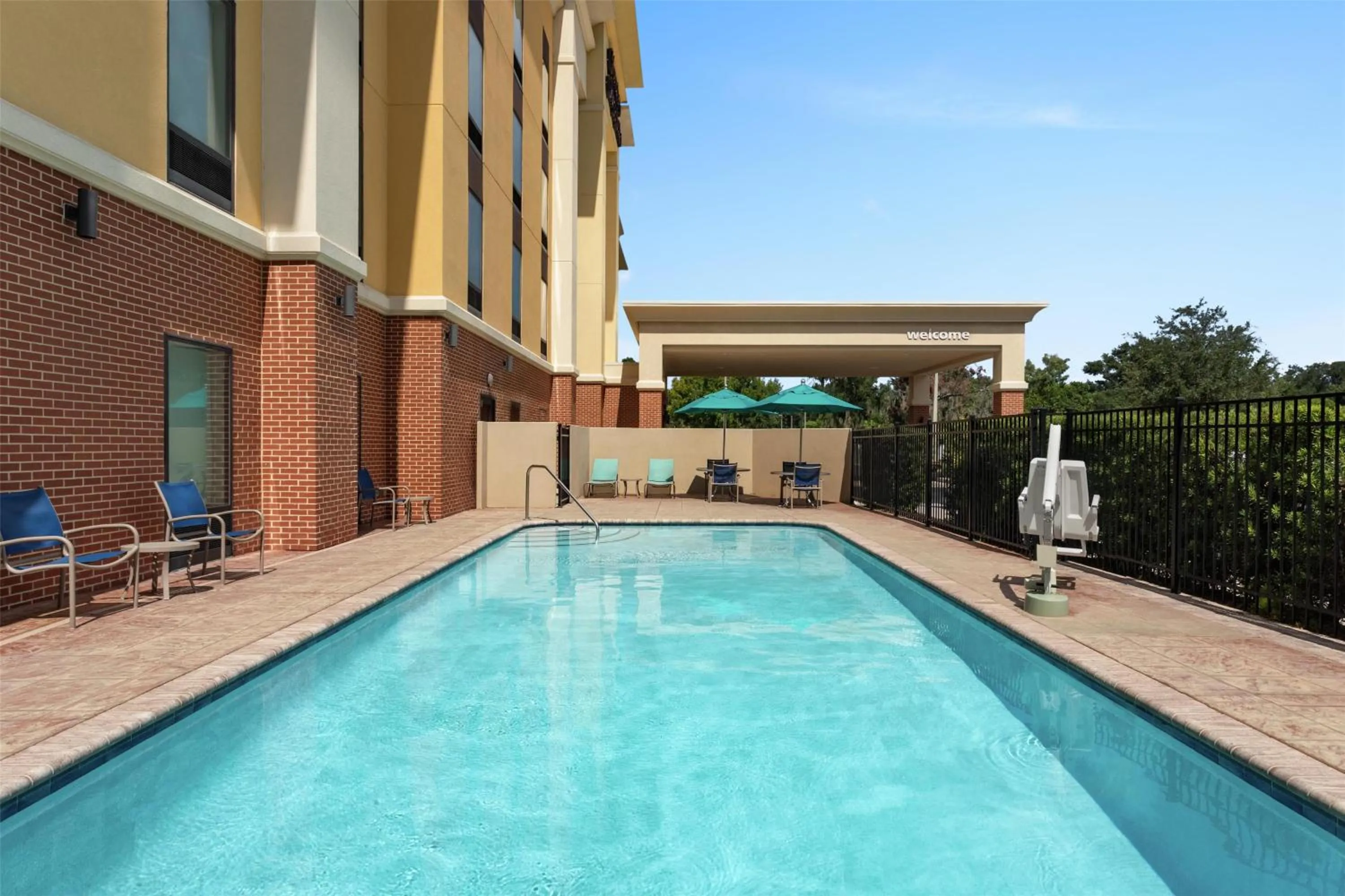 Pool view in Hampton Inn & Suites by Hilton Tampa Busch Gardens Area