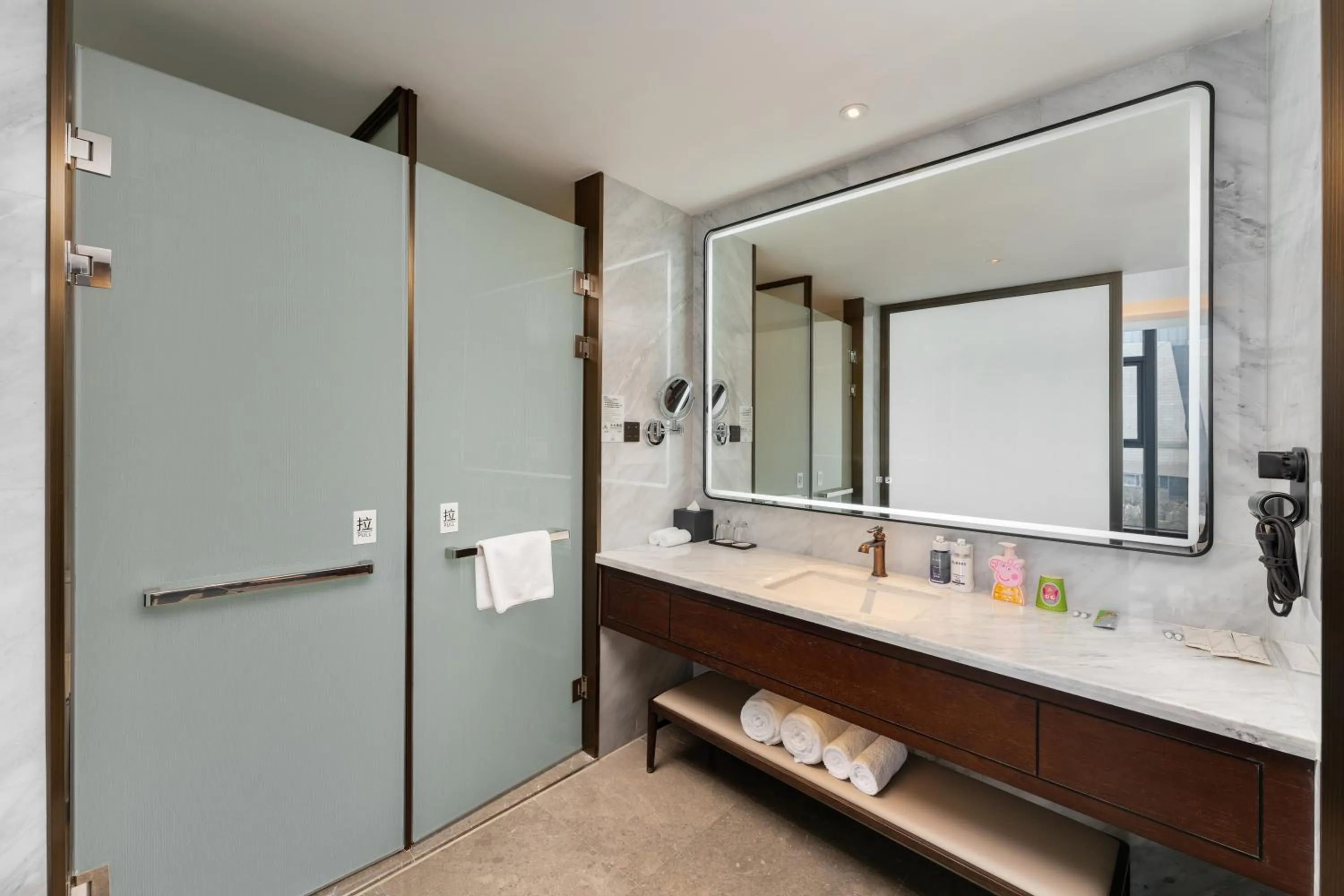 Bathroom in voco - Hangzhou Binjiang Minghao by IHG