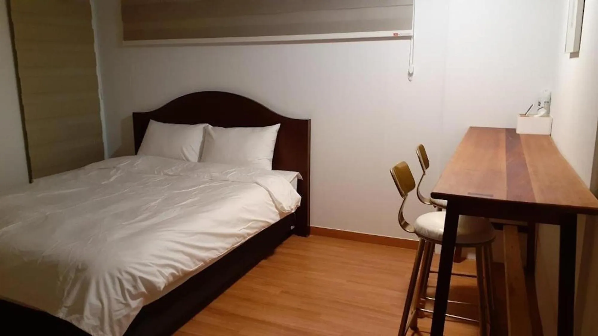 Bed in Sungsan Woori House Pension