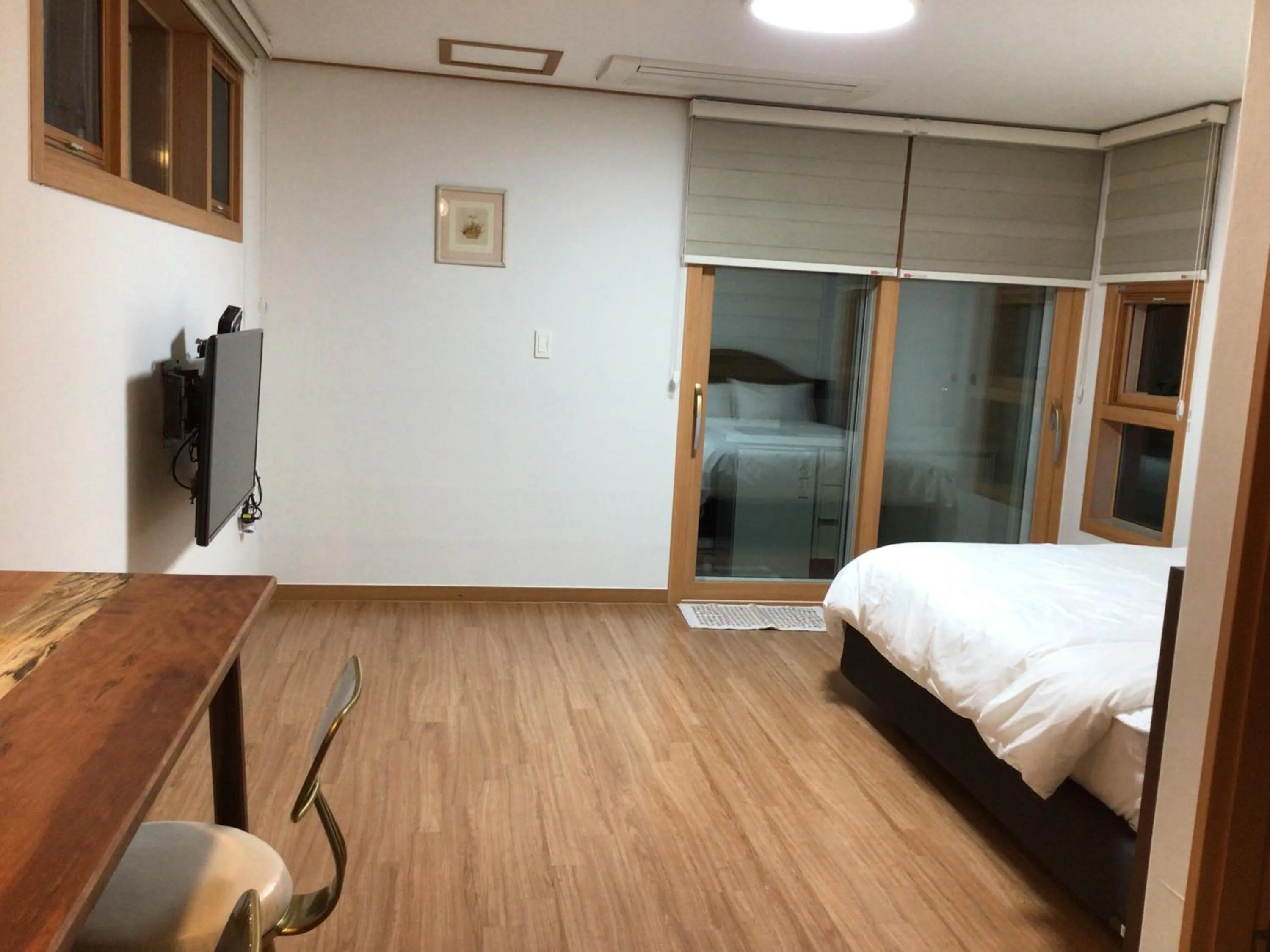 Bed in Sungsan Woori House Pension
