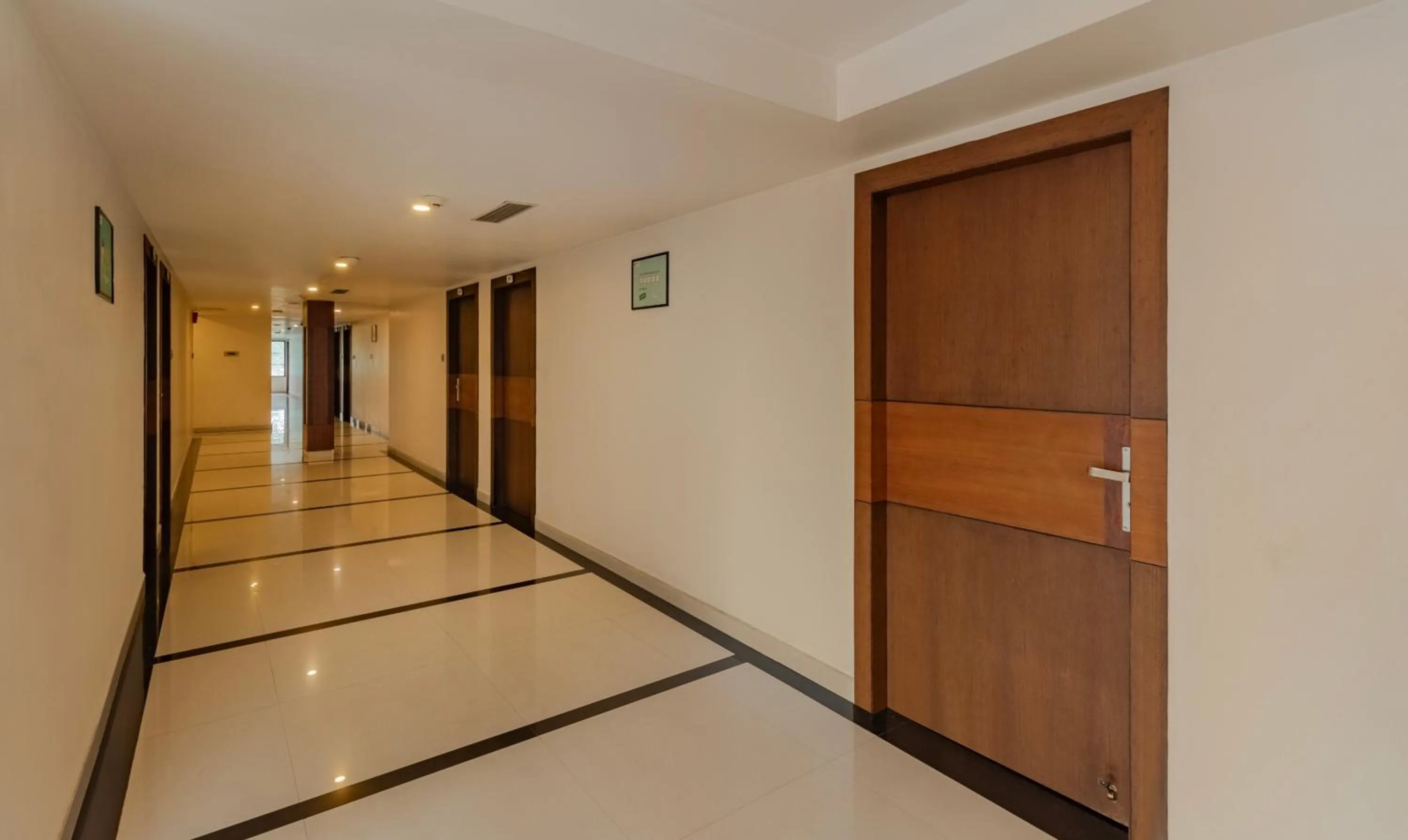 Lobby or reception in Treebo Premium Palmyra Milford, 2 Km From Alleppey Beach