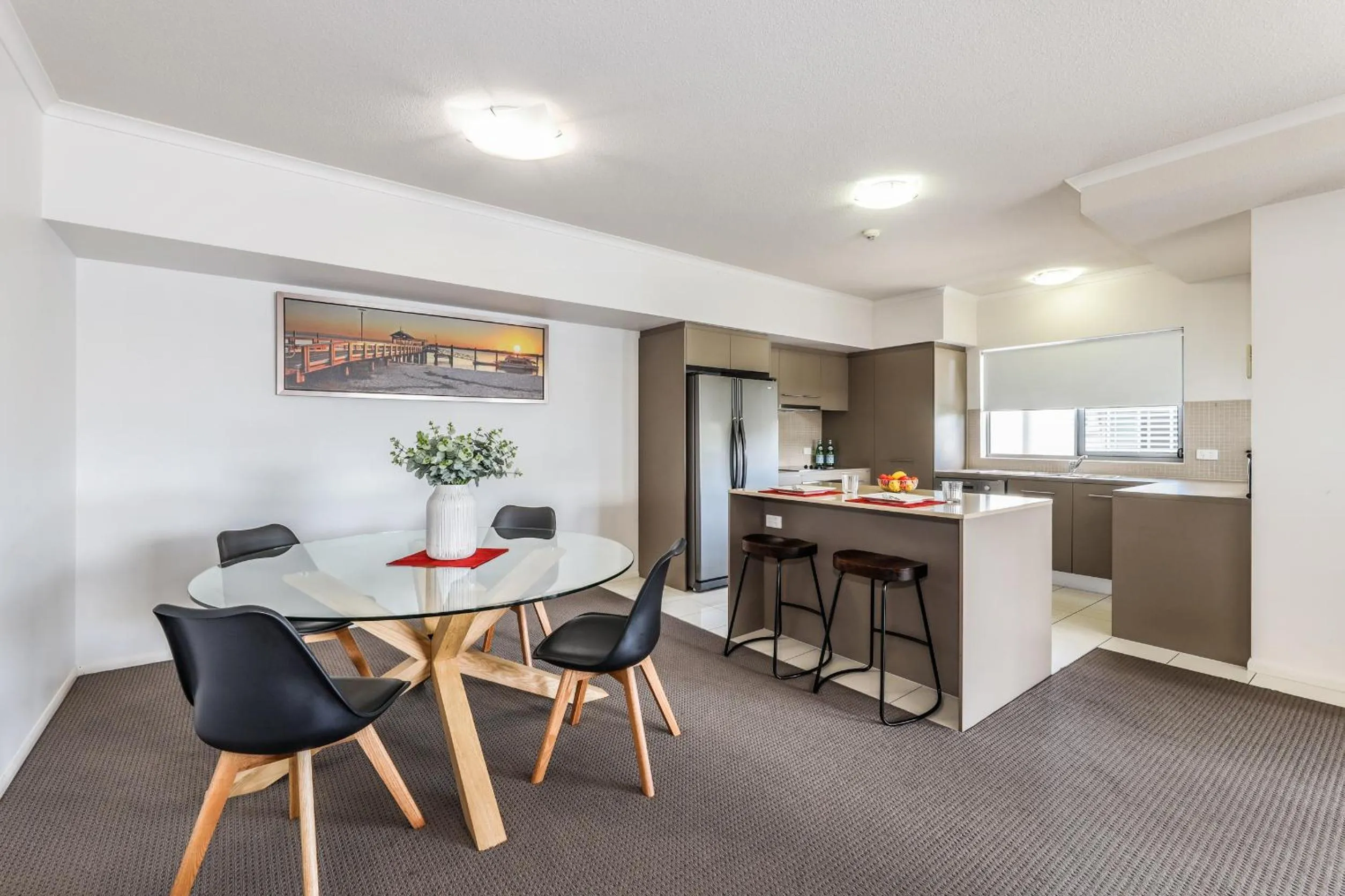 Dining area in On the Bay Apartments