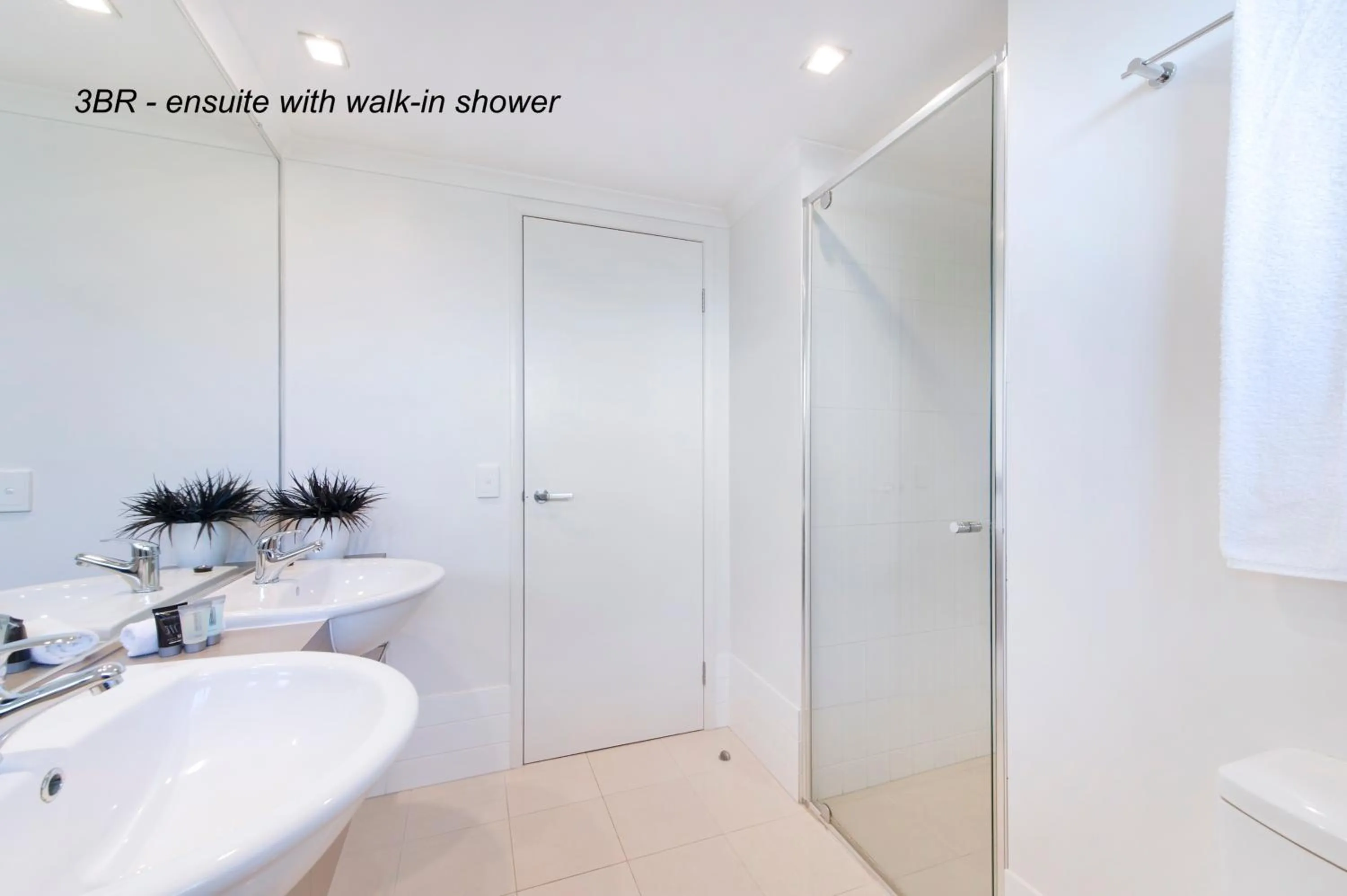 Shower in On the Bay Apartments