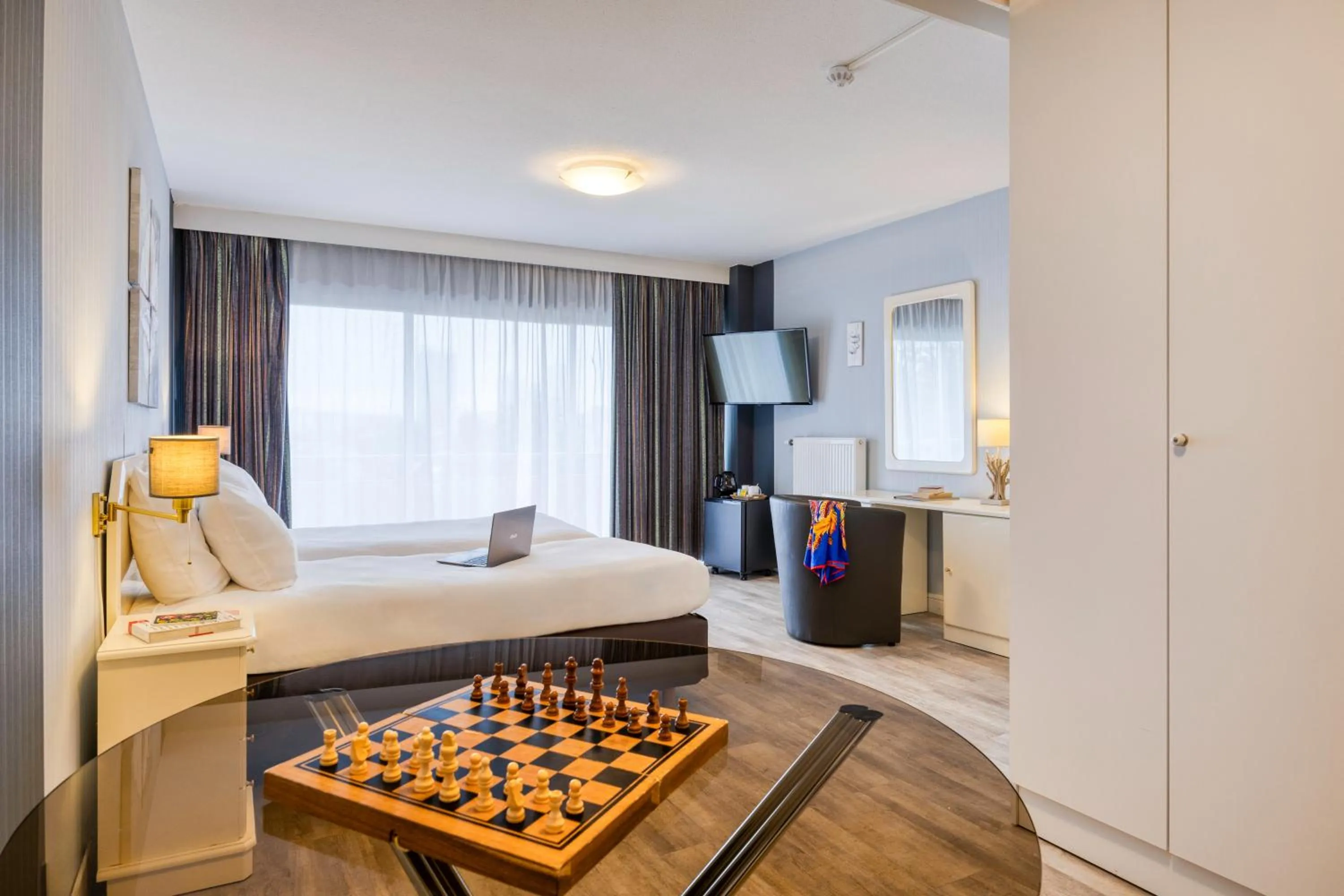 Bed in First Euroflat Hotel