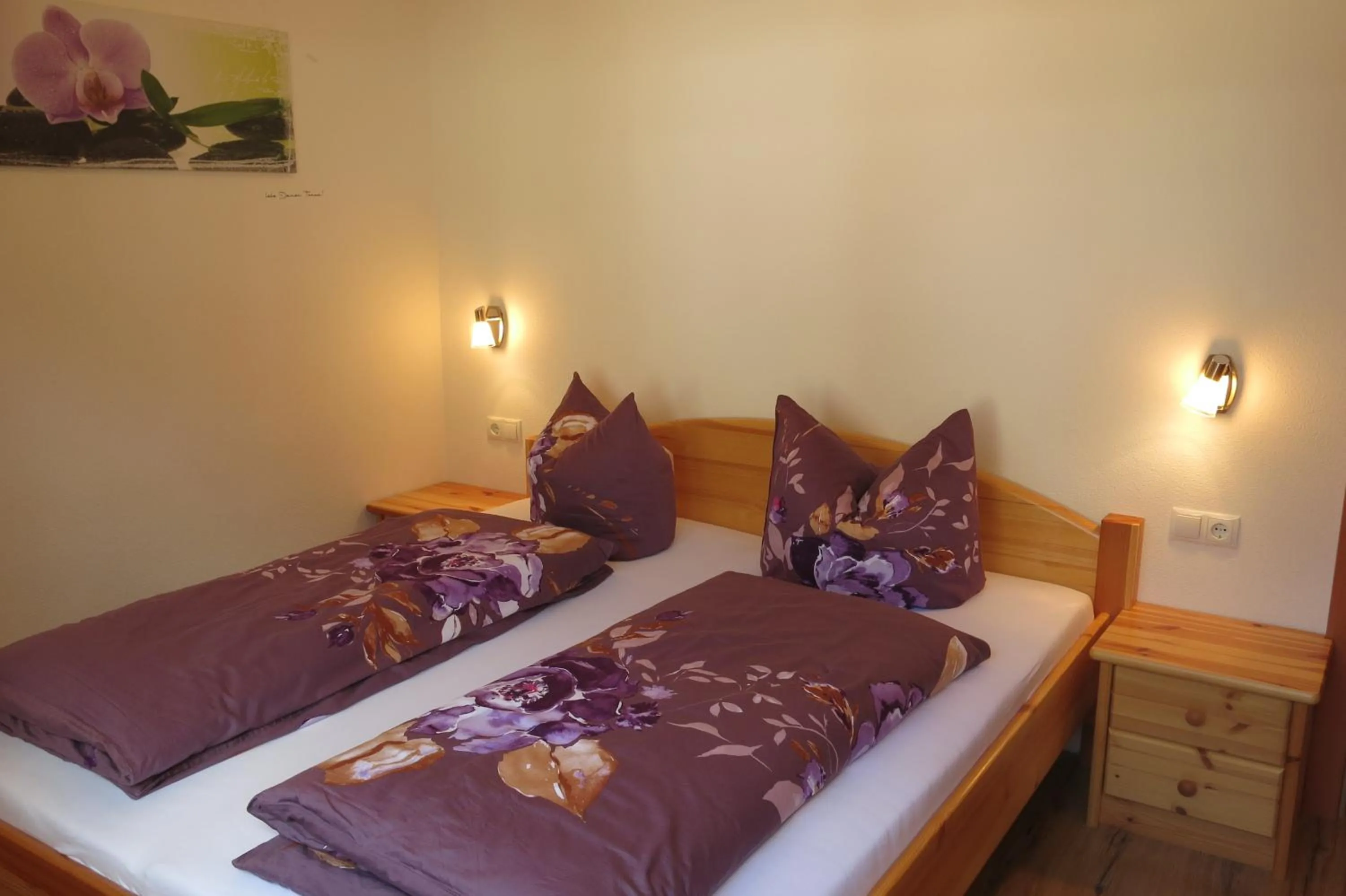 Bed in Ferienwohnung Kainer