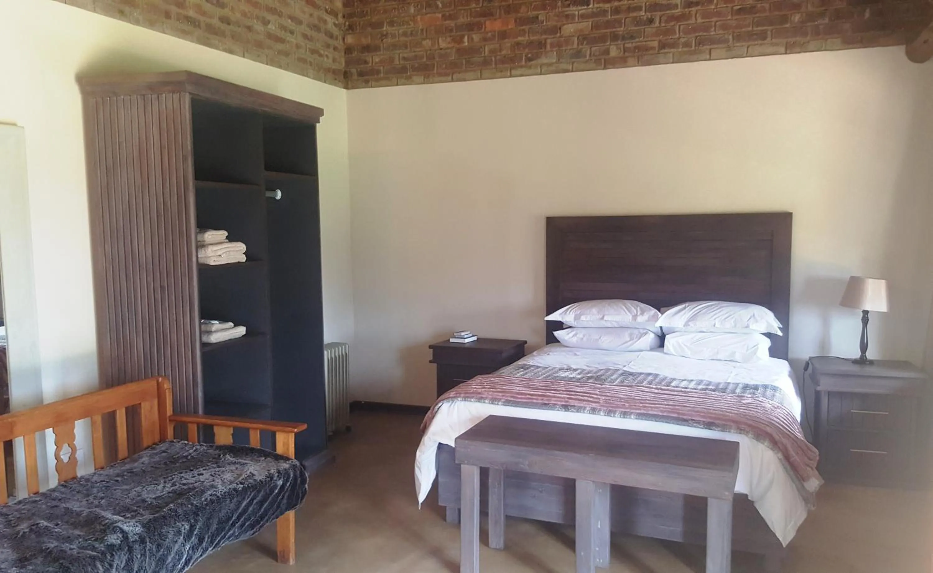 Bed in African Flair Country Lodge