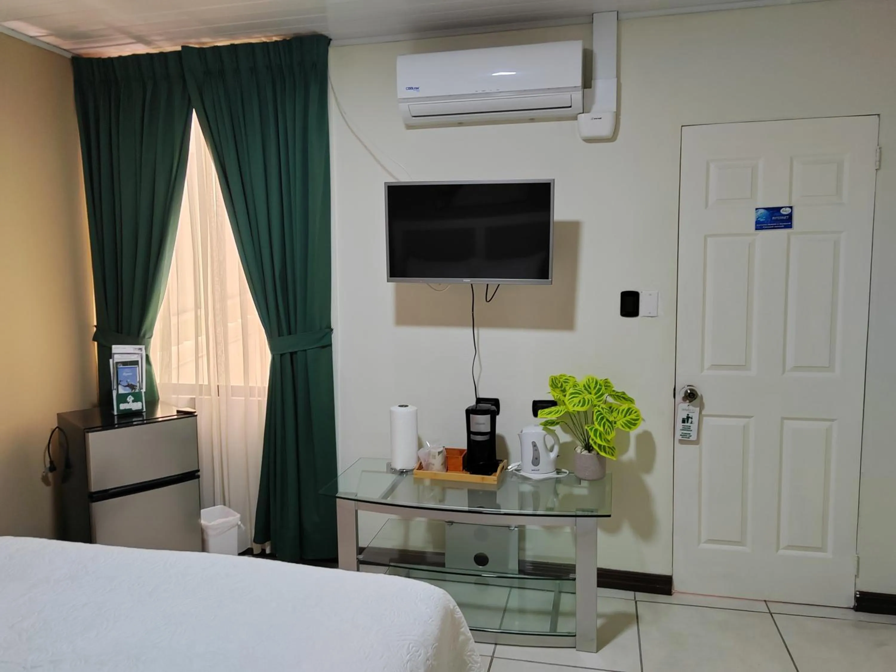 Bed in Hotel Bamboo Aeropuerto