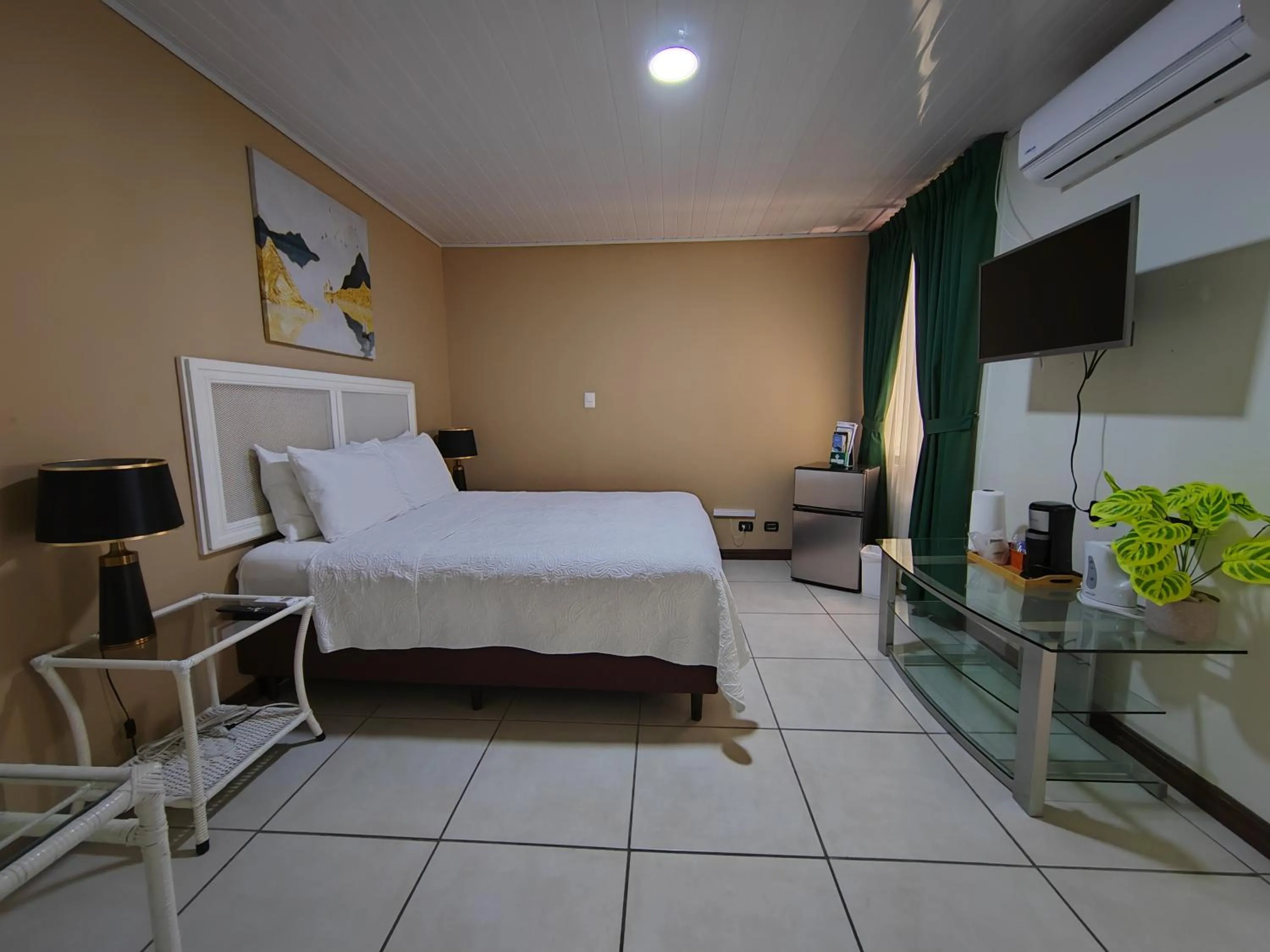 Bed in Hotel Bamboo Aeropuerto