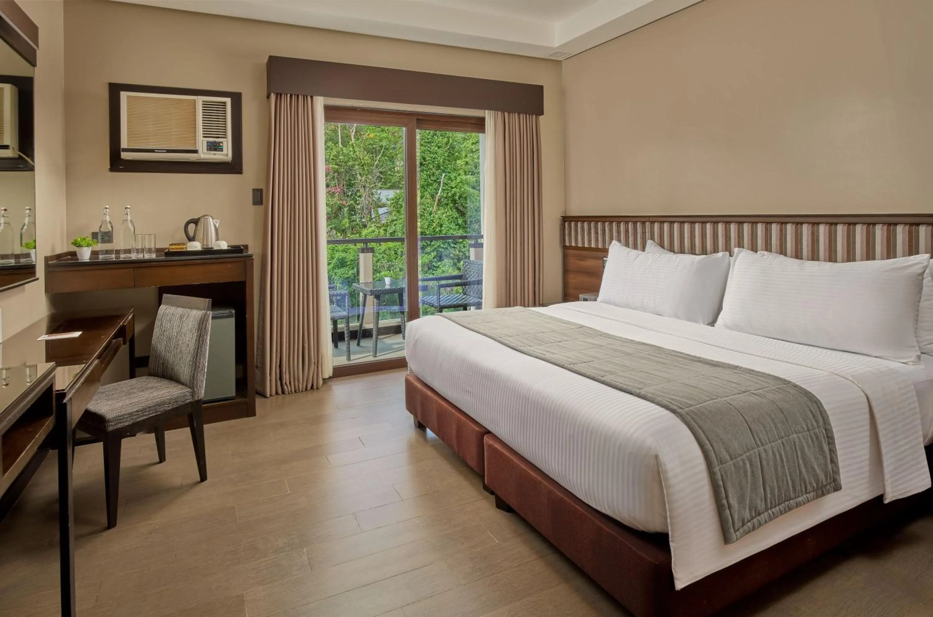 Bed in Two Seasons Coron Bayside Hotel