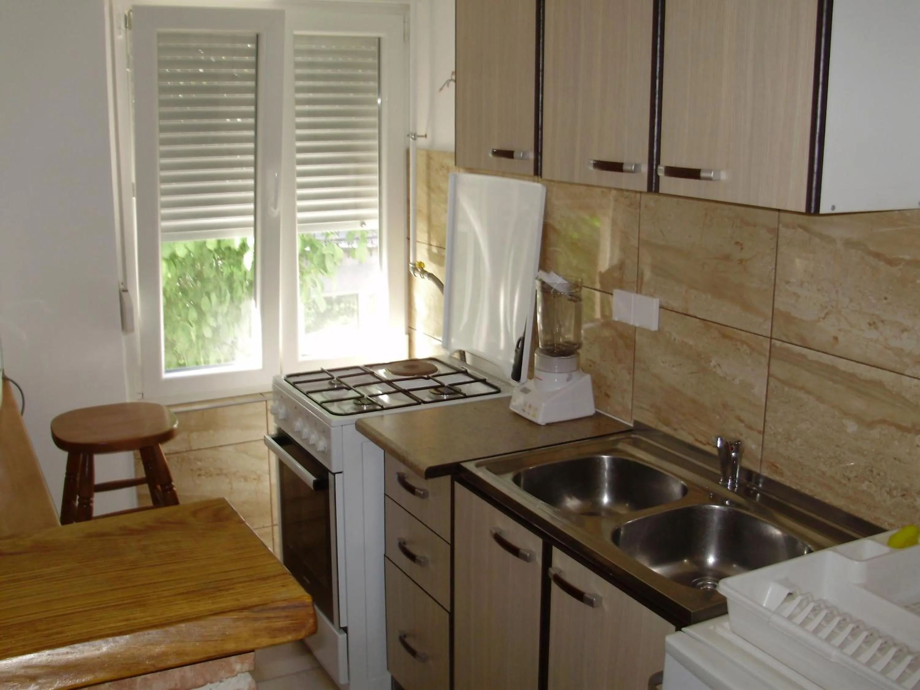 Kitchen or kitchenette in Apartment Maximilian-free parking!!!