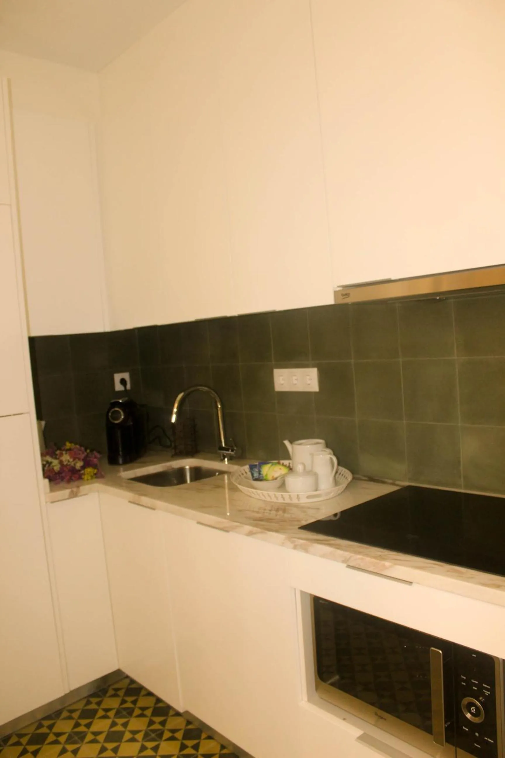 Kitchen or kitchenette in Arco Apartments