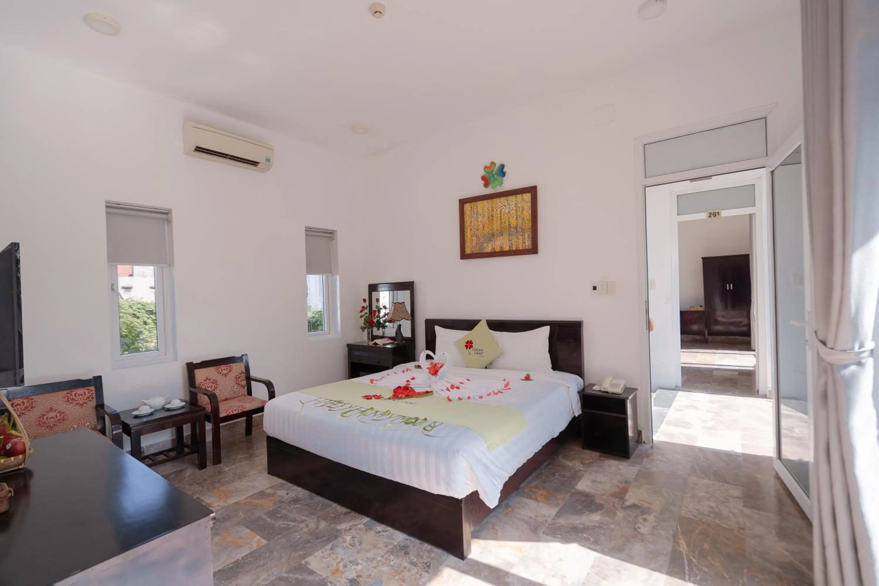 Bed in Lucky Leaf Hoian Villa