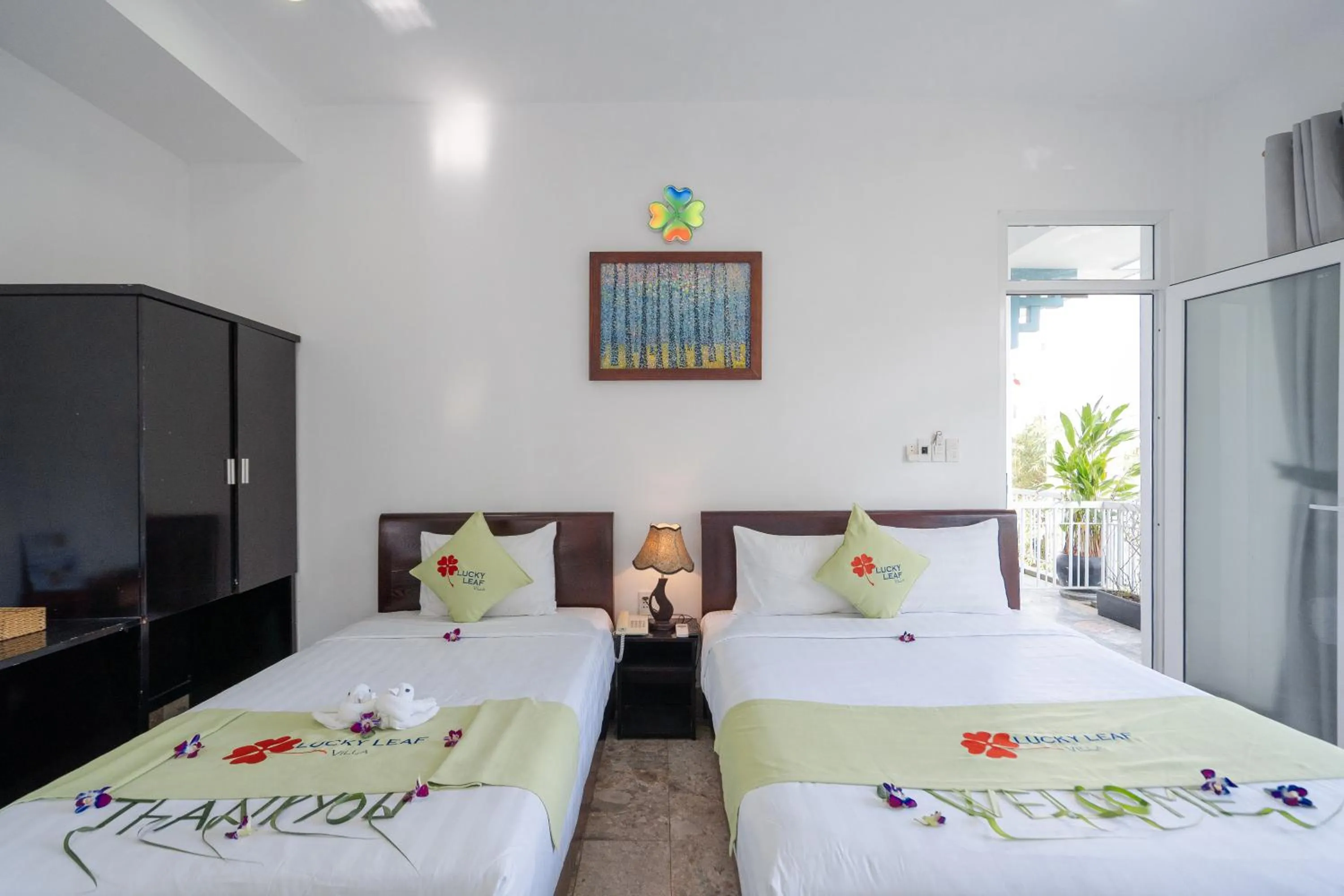 Bed in Lucky Leaf Hoian Villa
