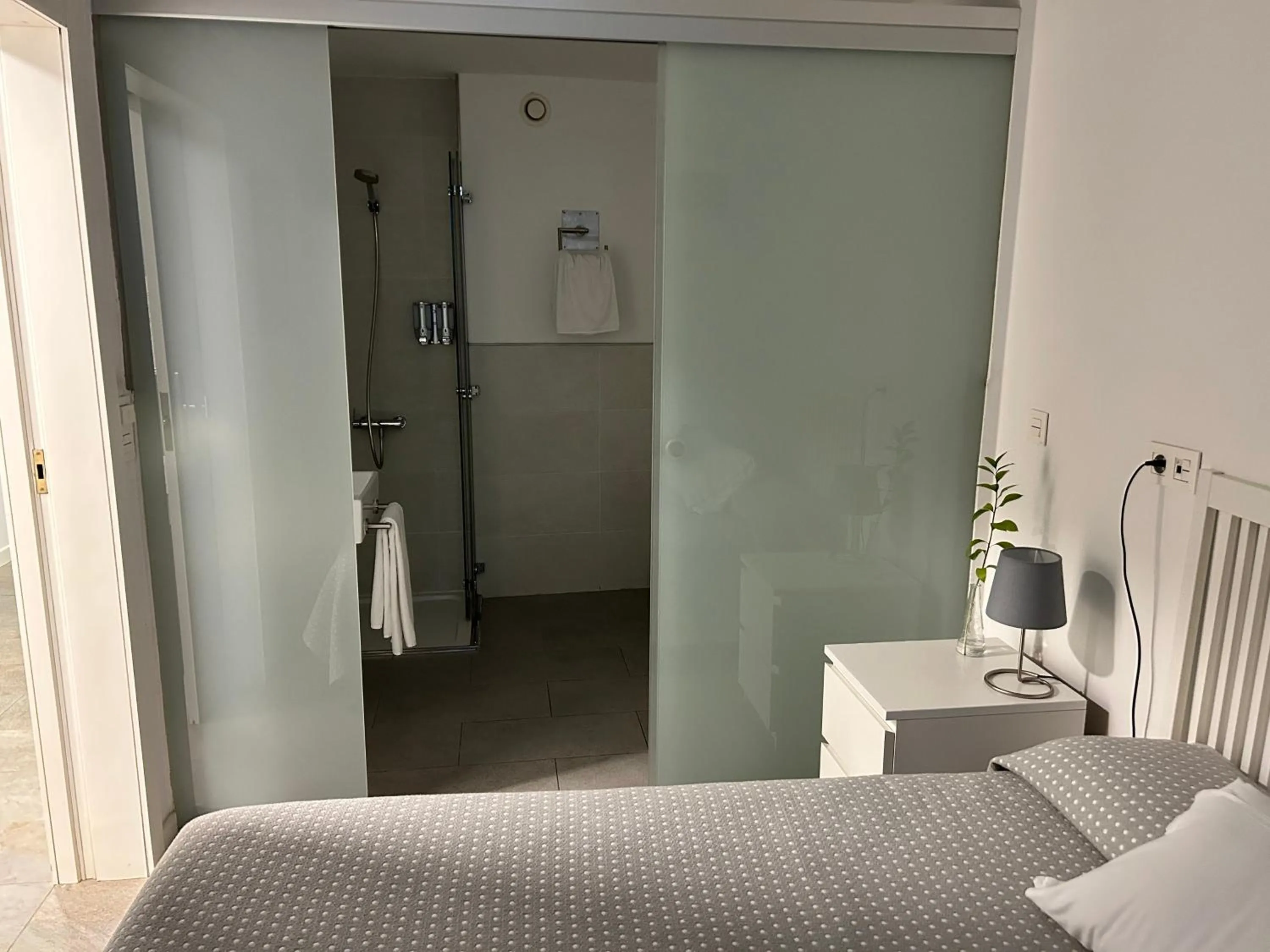 Bed in Pensión Rua Nova