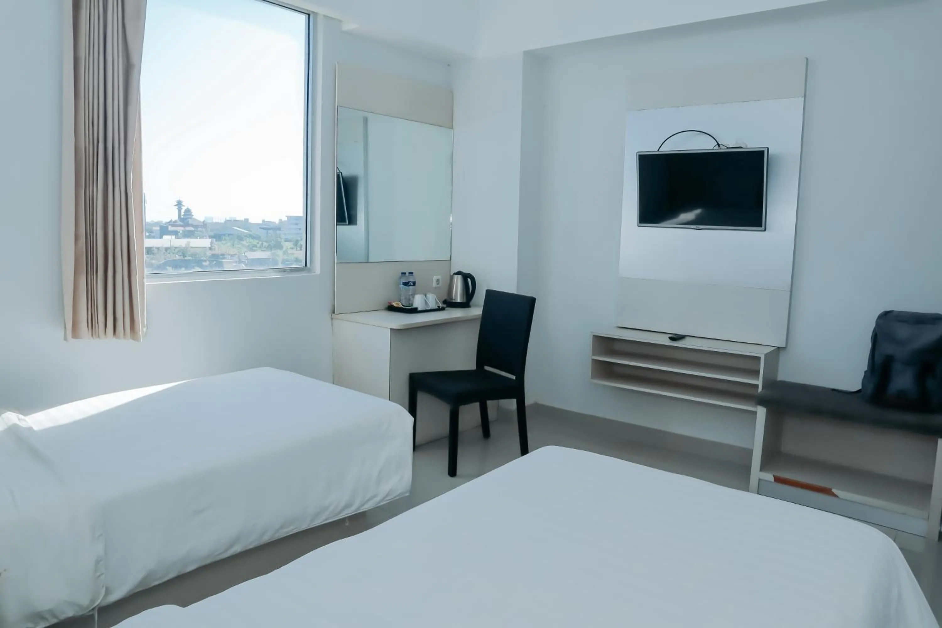 View (from property/room), Bed in Liberta Hotel Grand Sayang Makassar