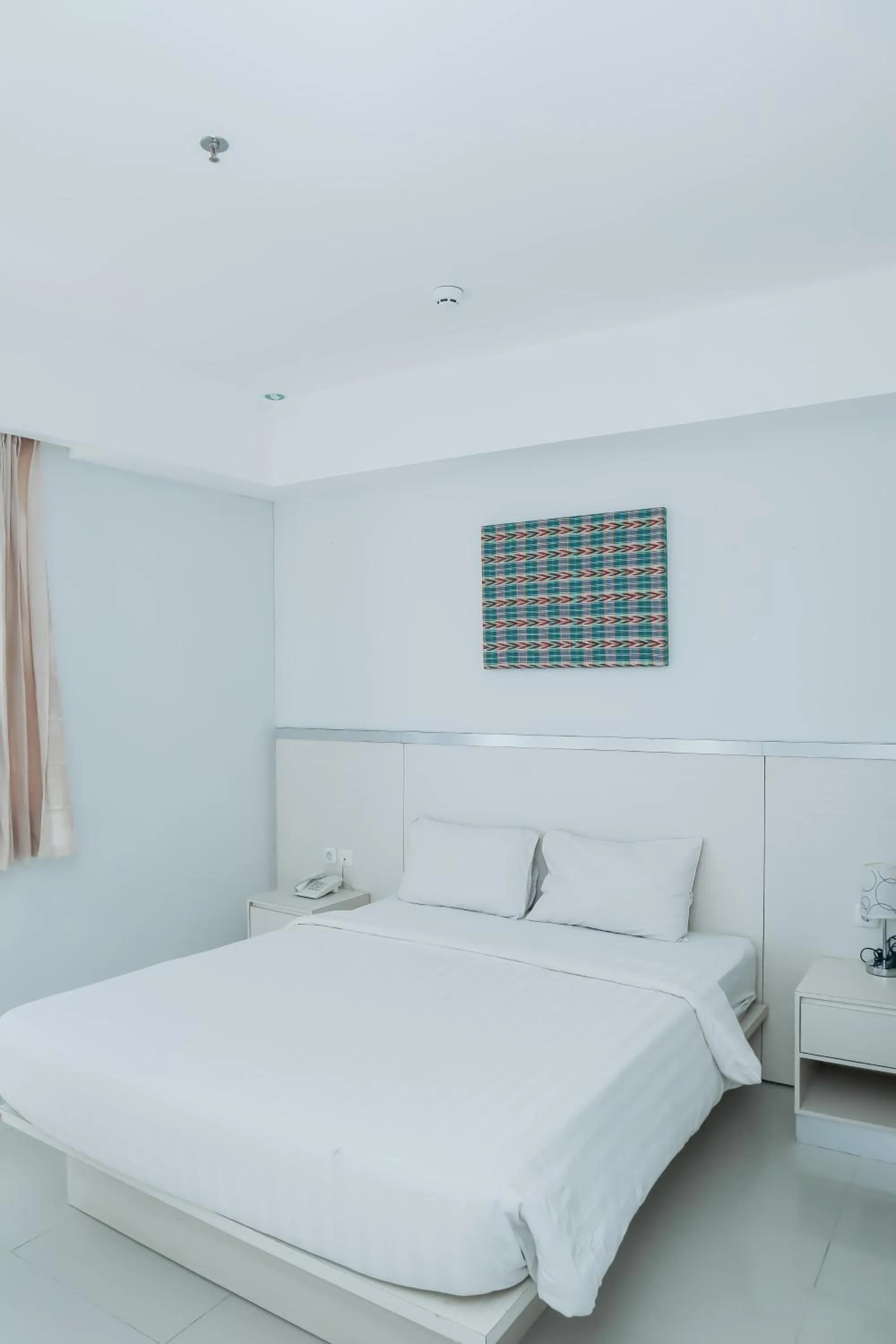 Bed in Liberta Hotel Grand Sayang Makassar