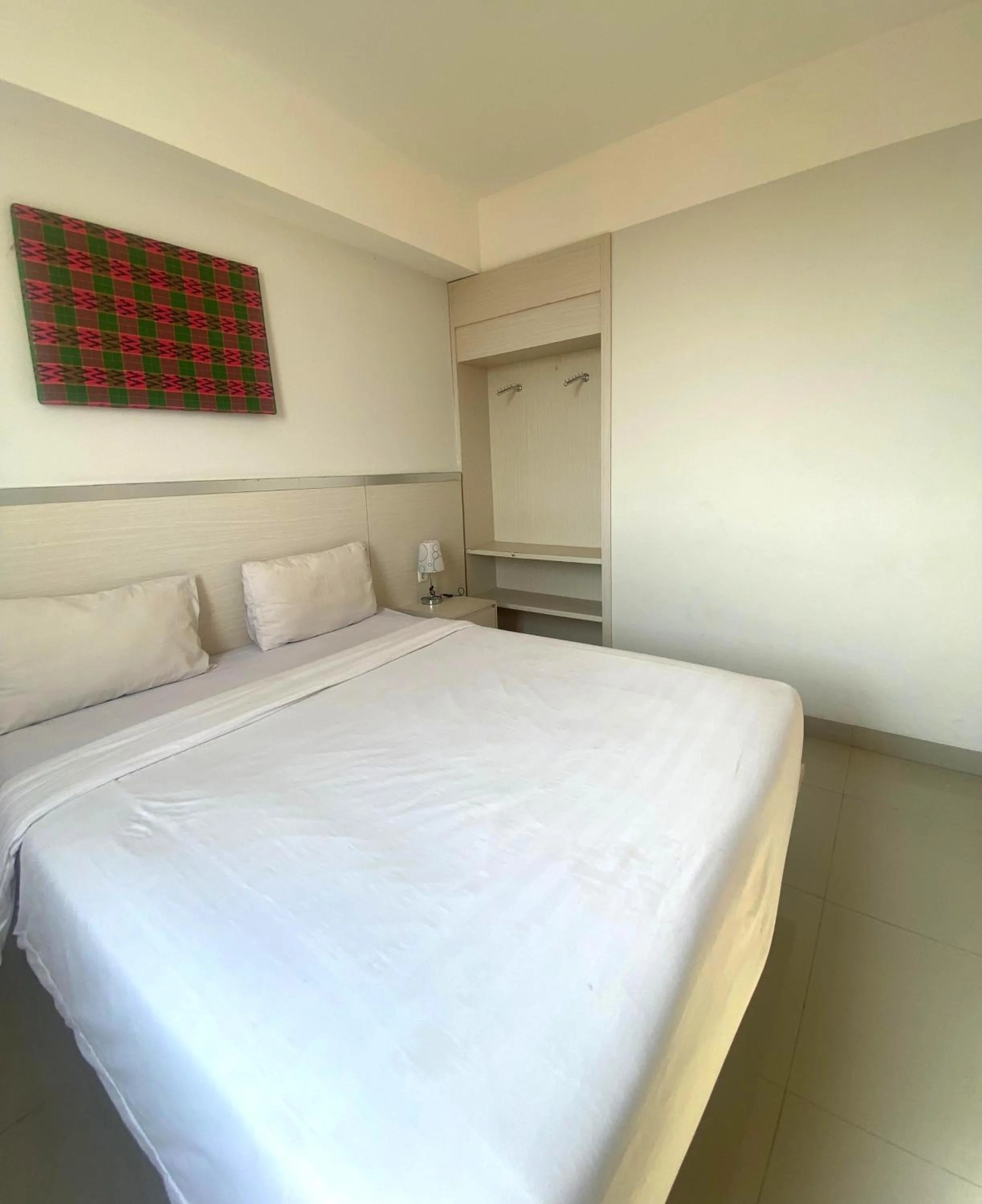 Bed in Liberta Hotel Grand Sayang Makassar