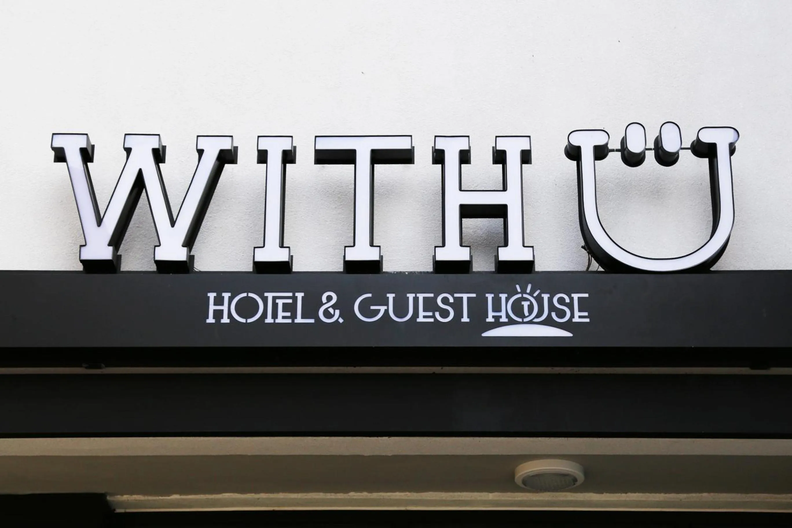 Property logo or sign in With U Hotel & Guesthouse