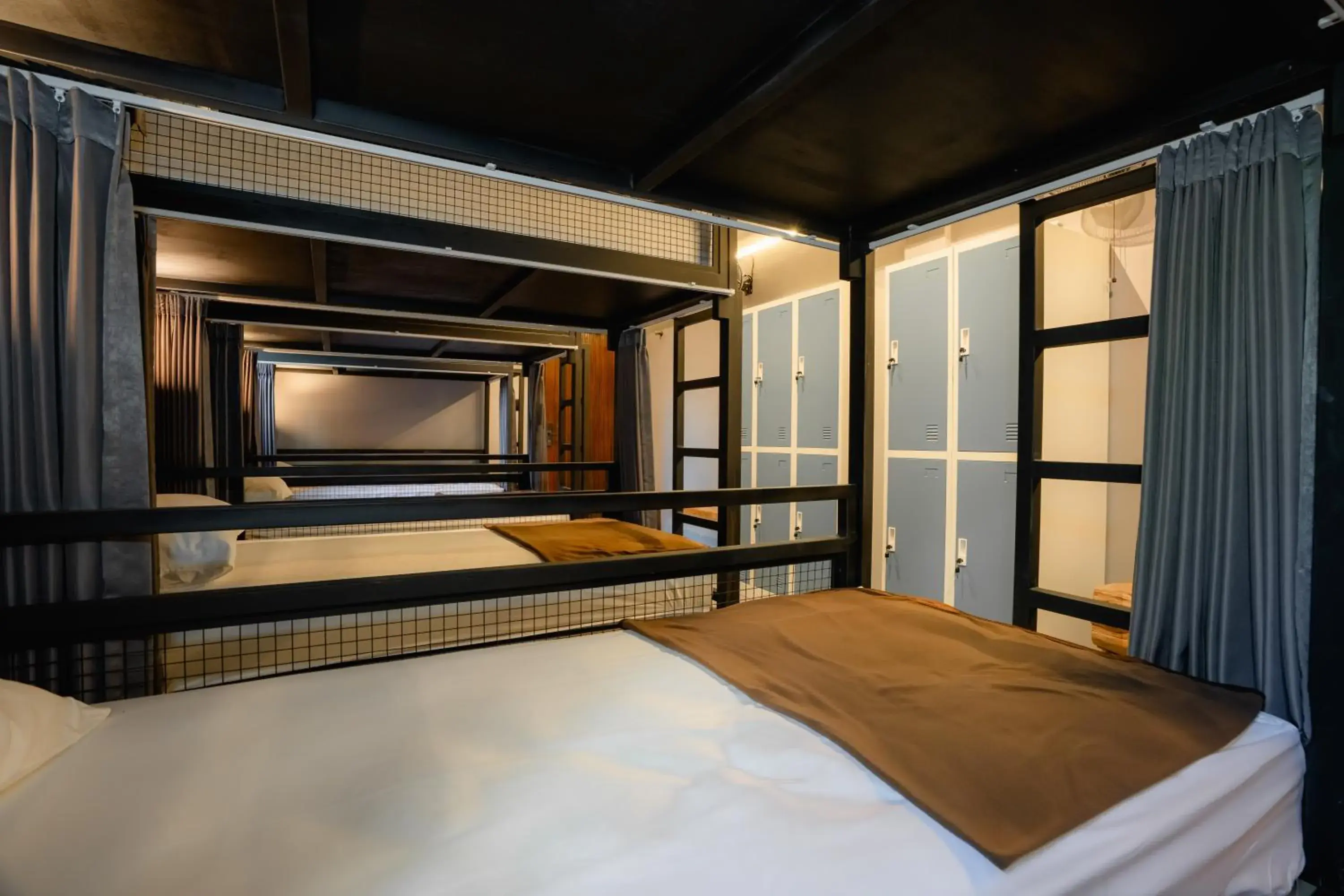 Bunk Bed in Mixed Dormitory Room in Palm Garden Kuta Bunk Bed in Mixed Dormitory Room in Palm Garden Kuta