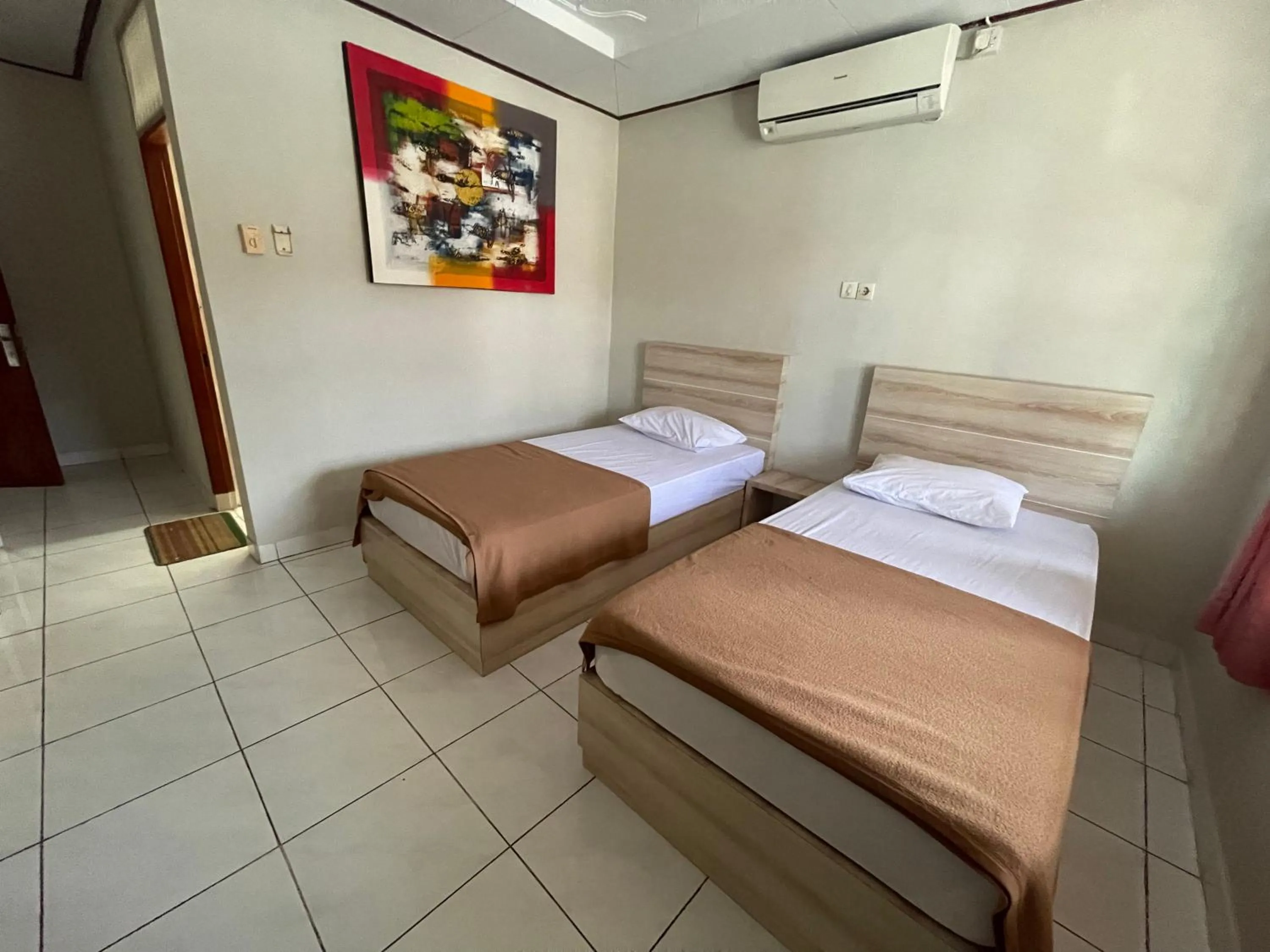 Bed in Palm Garden Kuta