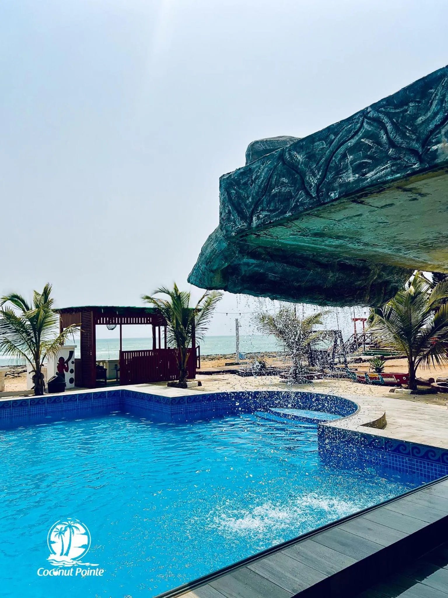Swimming pool in Coconut Pointe Villa & Beach Resort