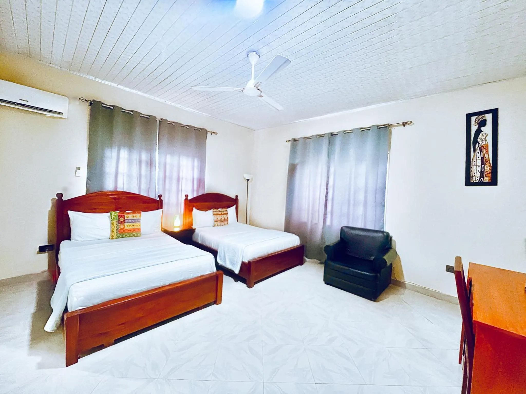 Bed in Coconut Pointe Villa & Beach Resort