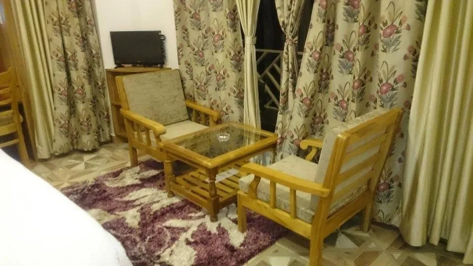 Seating area in The Golden Peak, Hotel