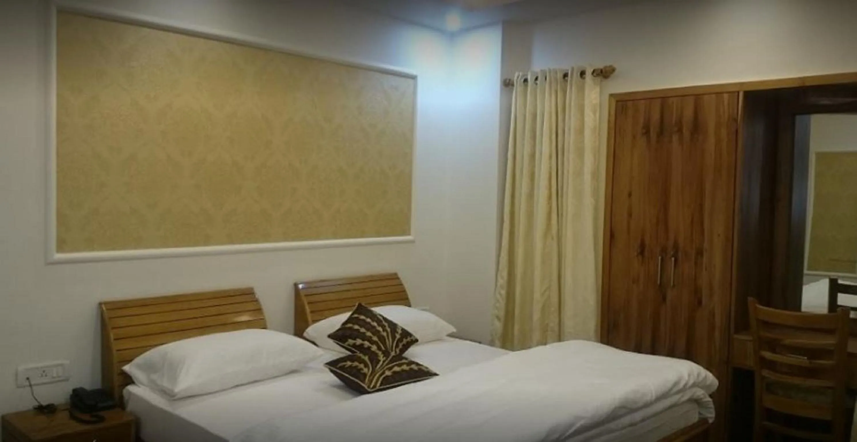 Bedroom in The Golden Peak, Hotel