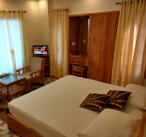 Bedroom in The Golden Peak, Hotel