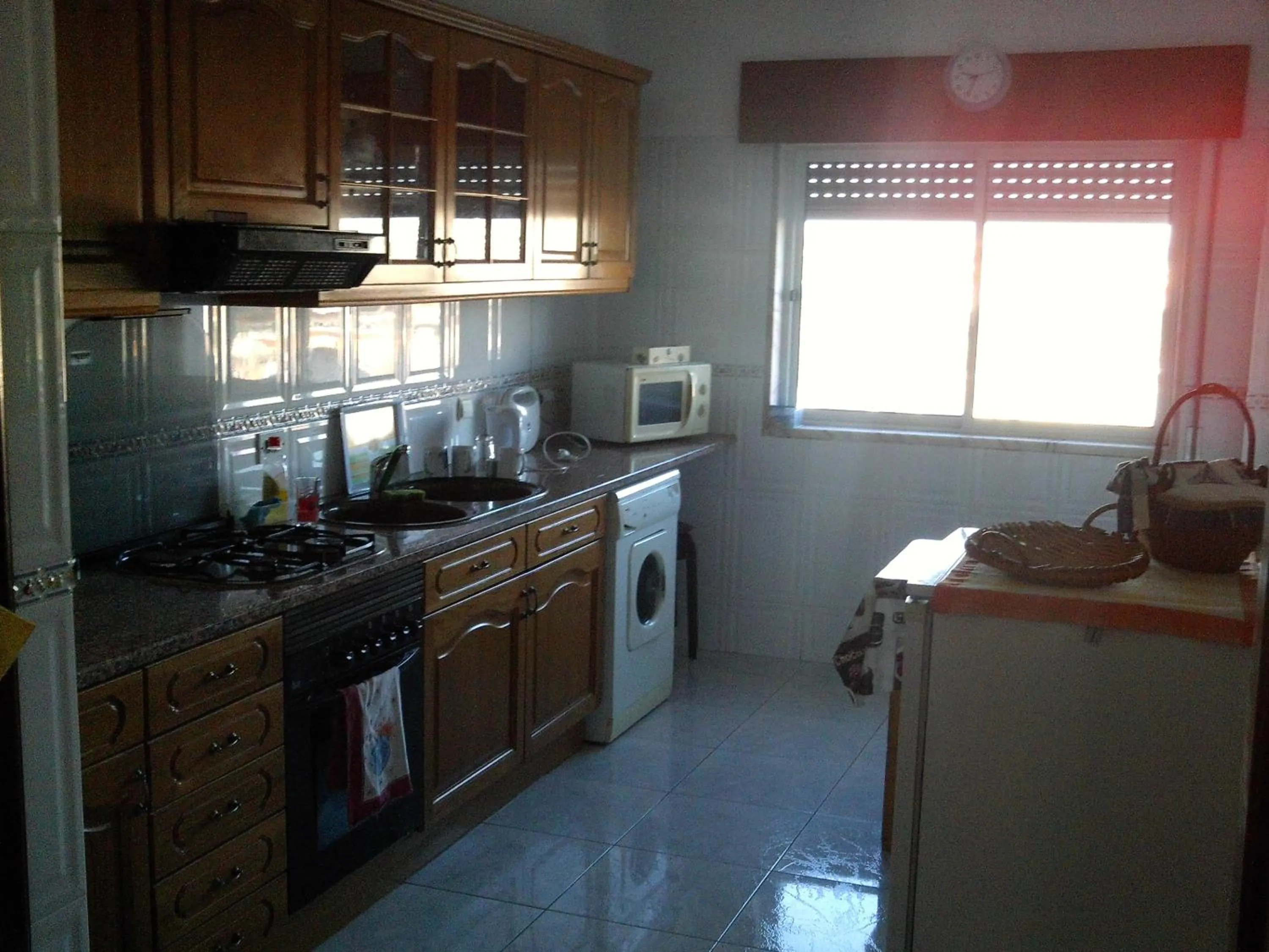 Communal kitchen in Homestay Marialva Park