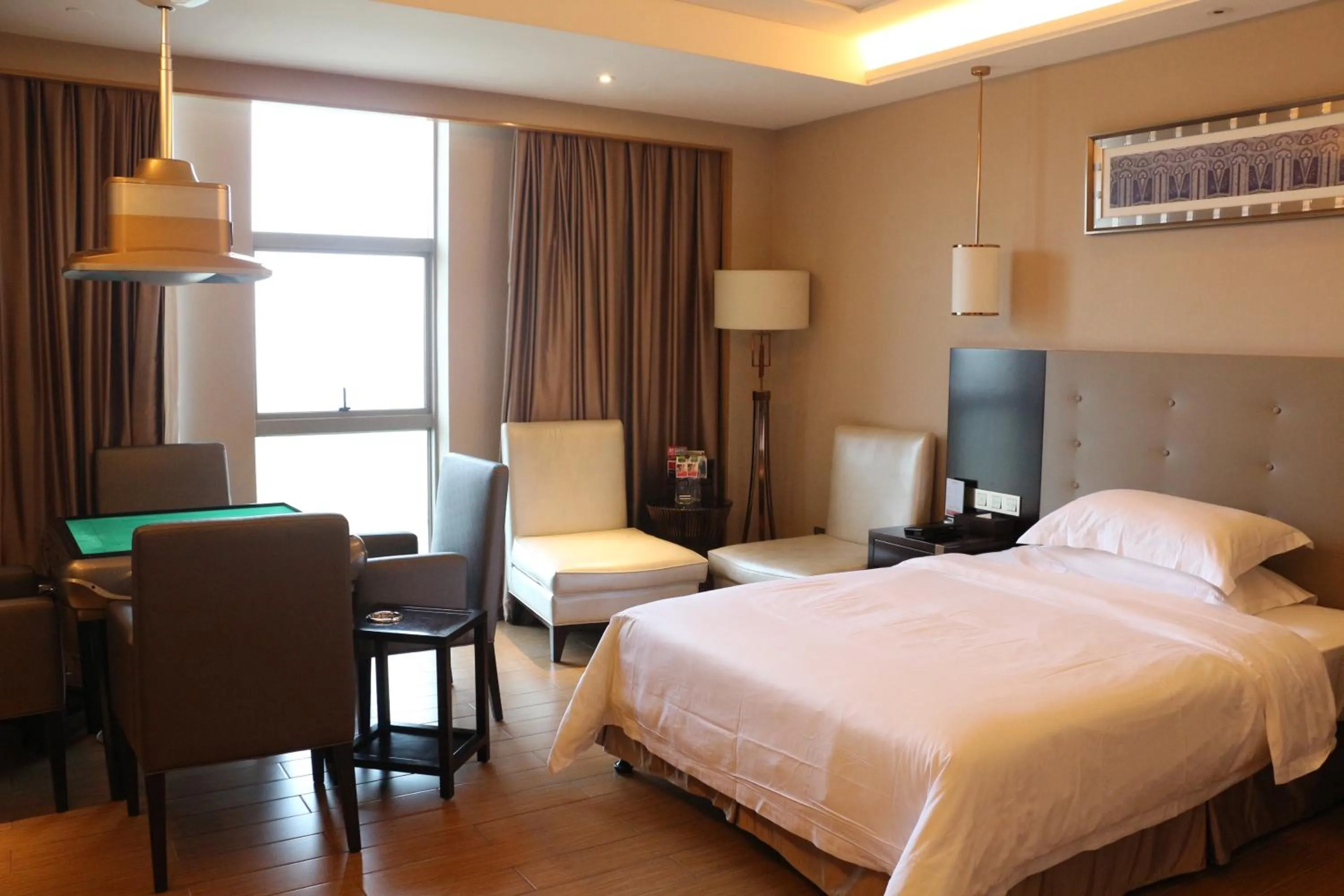 Bed in Ramada Yiyang Taojiang