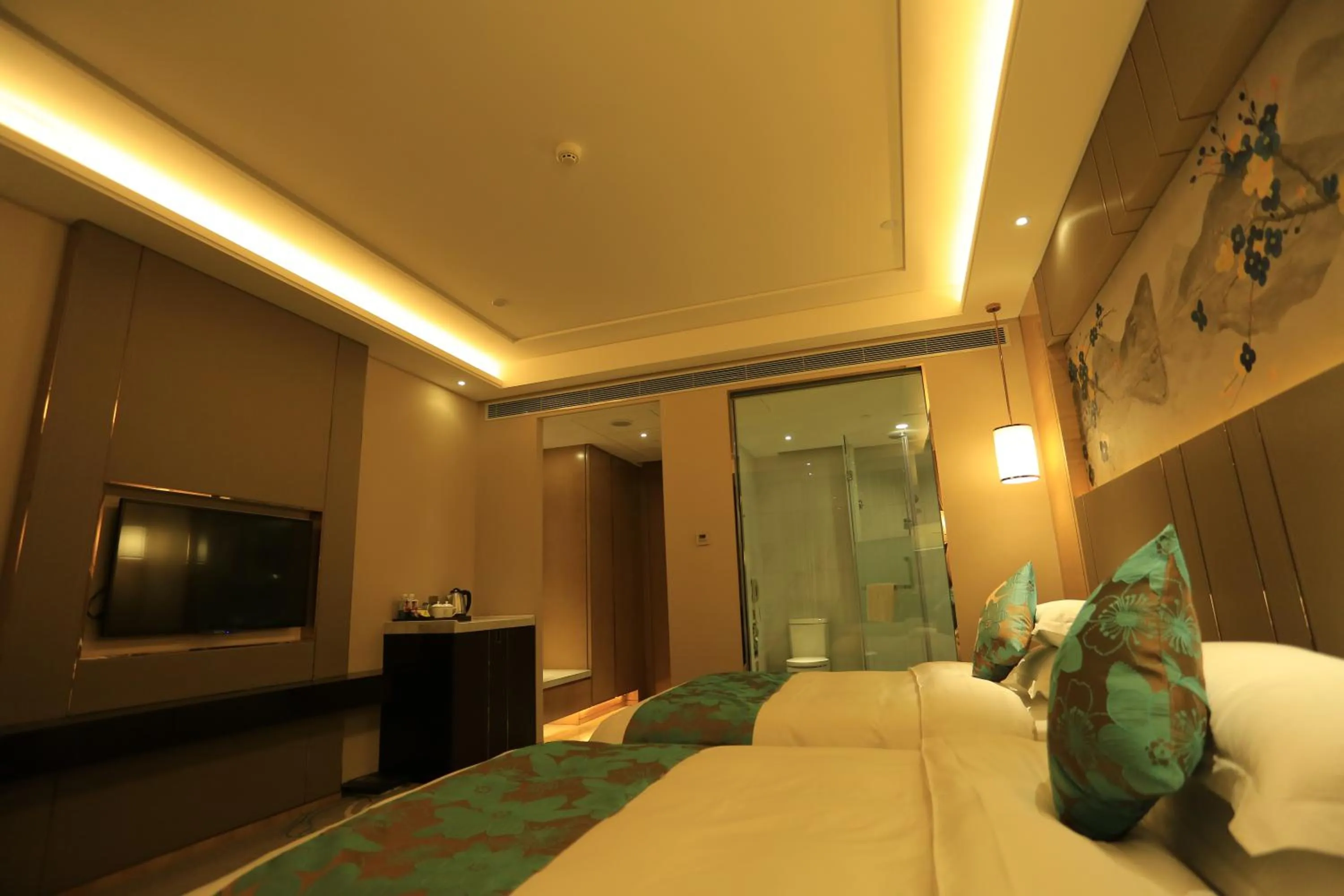 Bed in Ramada Yiyang Taojiang