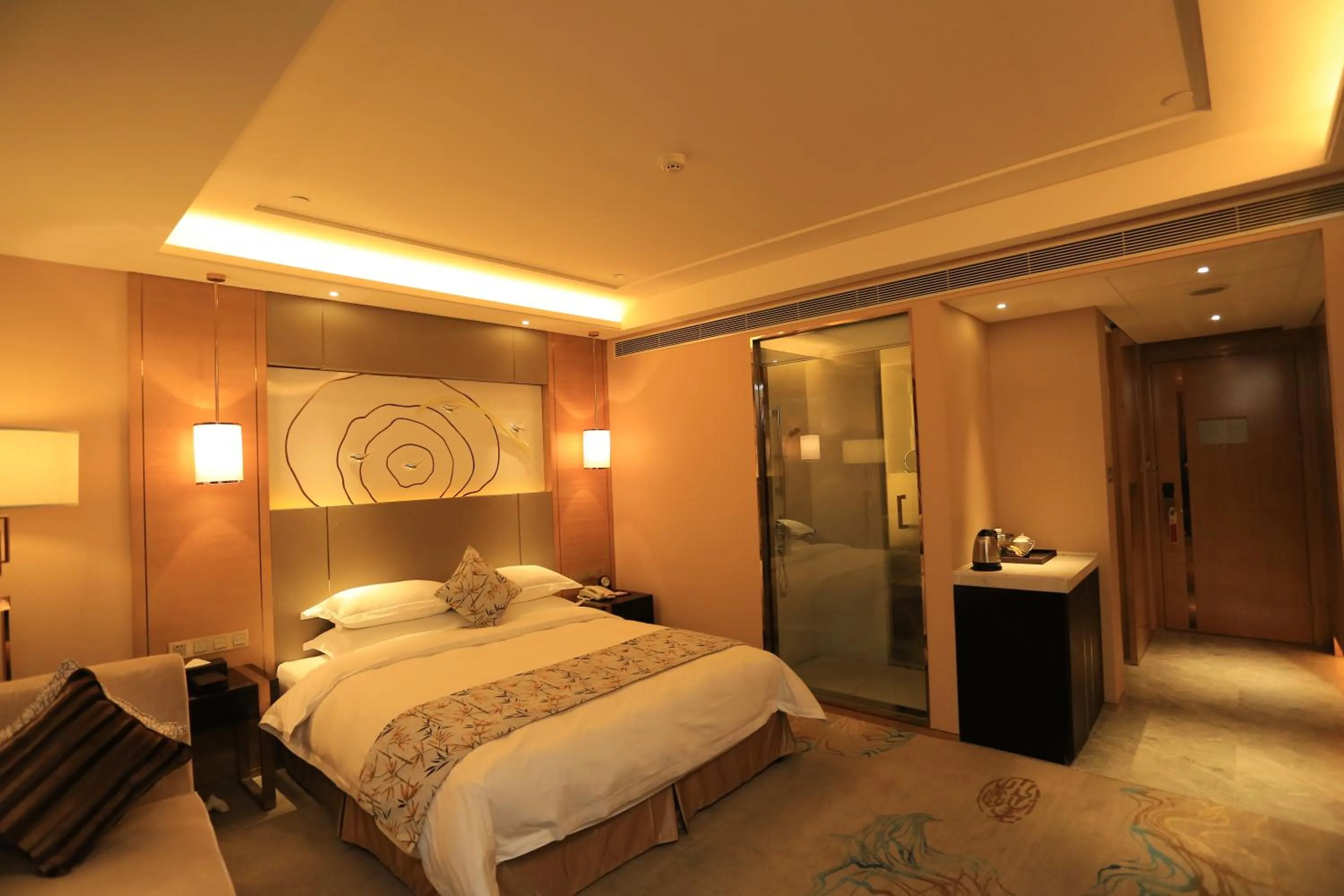 Bed in Ramada Yiyang Taojiang