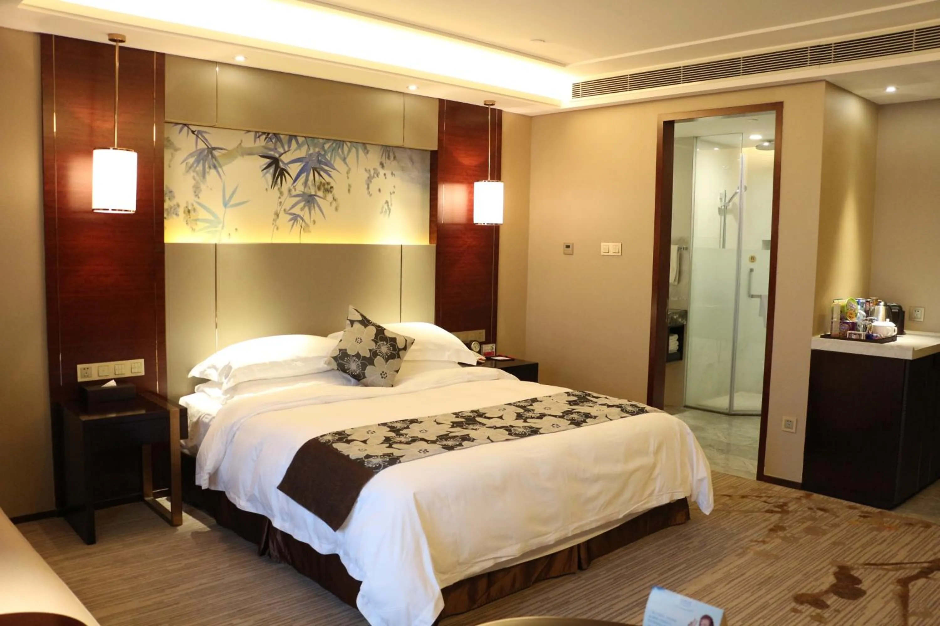 Bed in Ramada Yiyang Taojiang