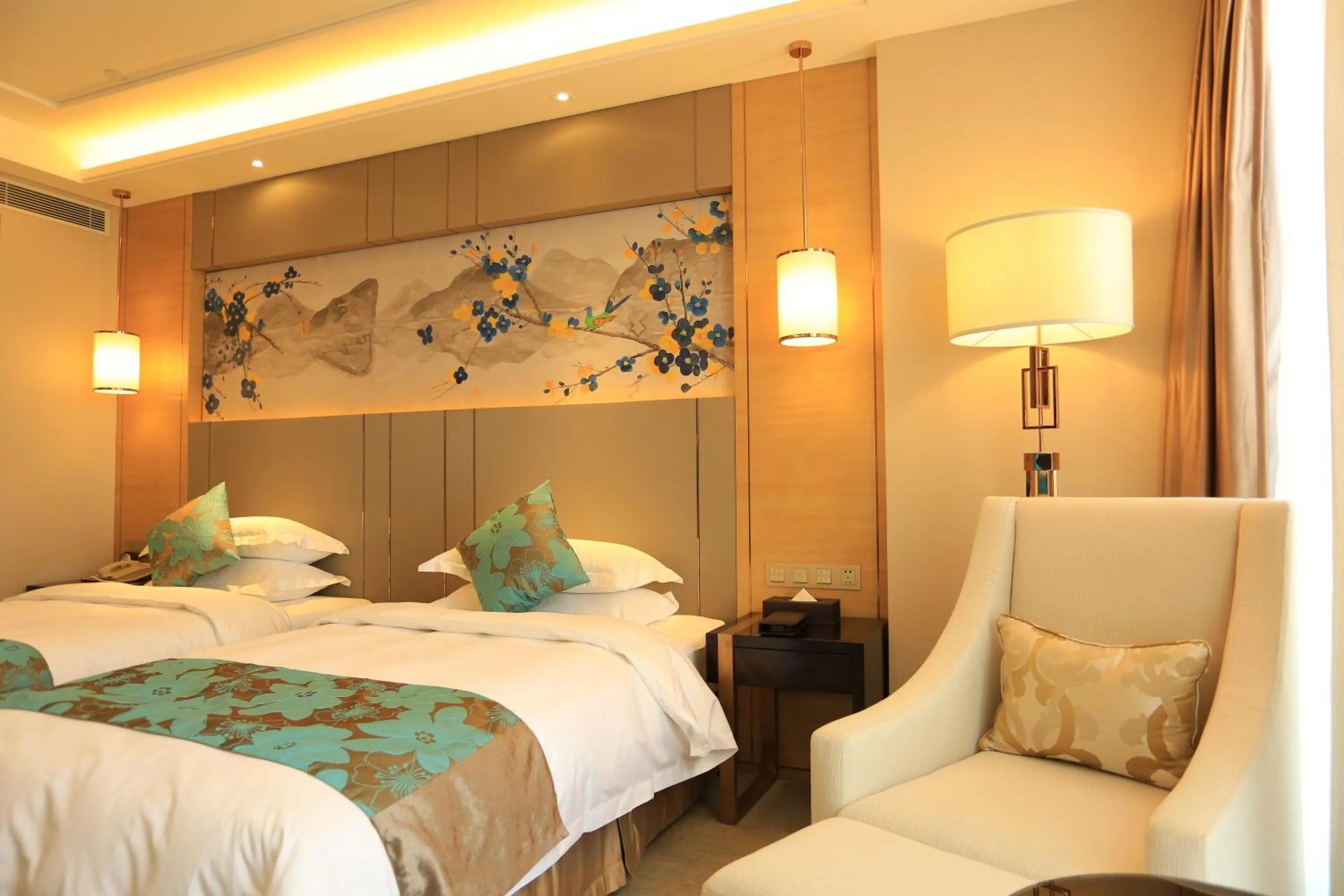 Bed in Ramada Yiyang Taojiang
