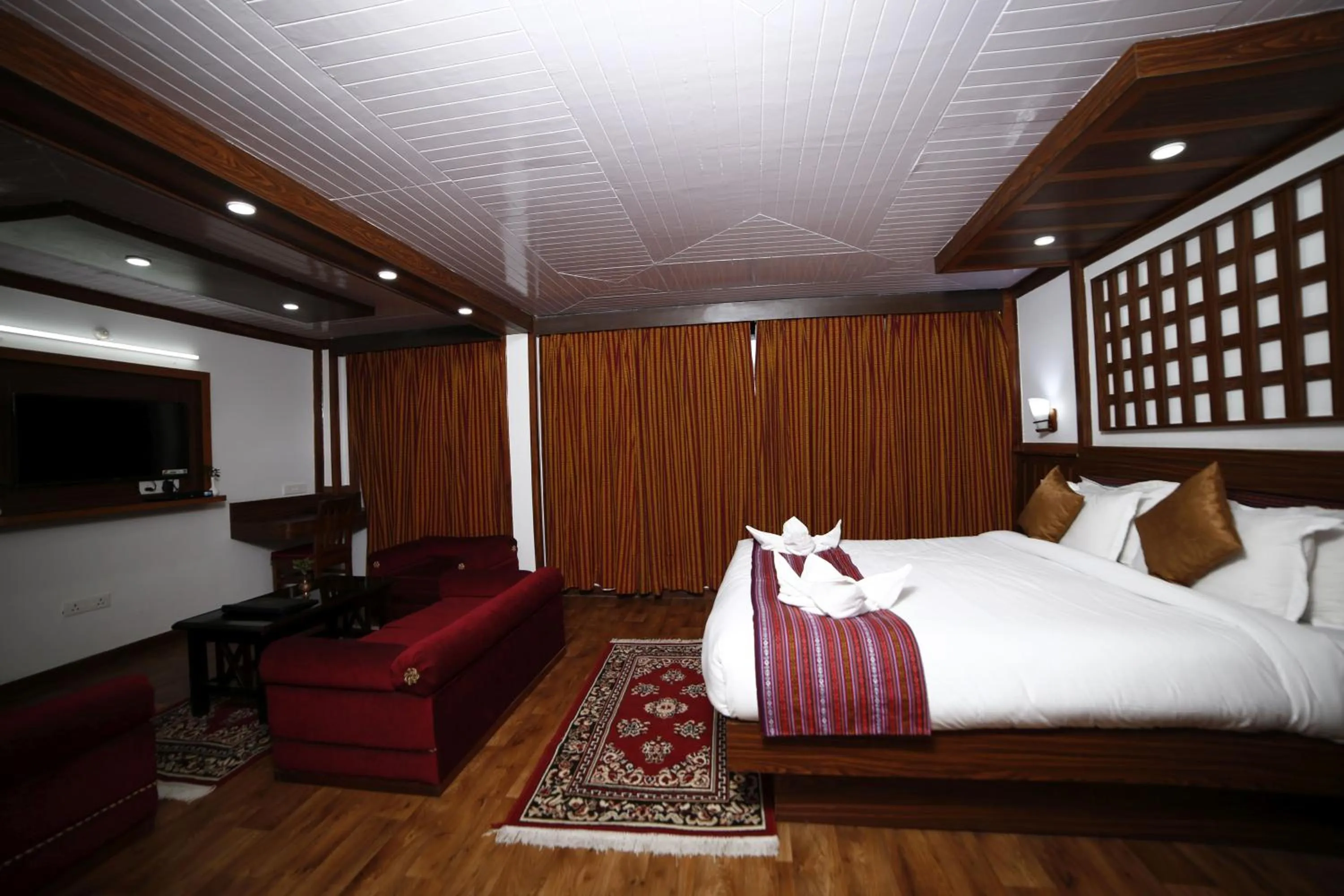 Photo of the whole room, Bed in Sikkim Tourist Centre