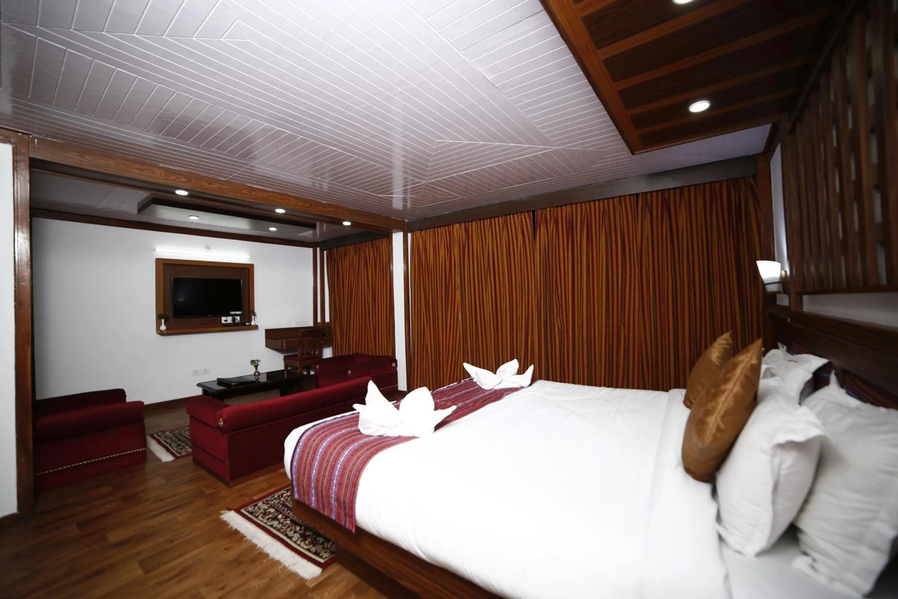 Photo of the whole room, Bed in Sikkim Tourist Centre