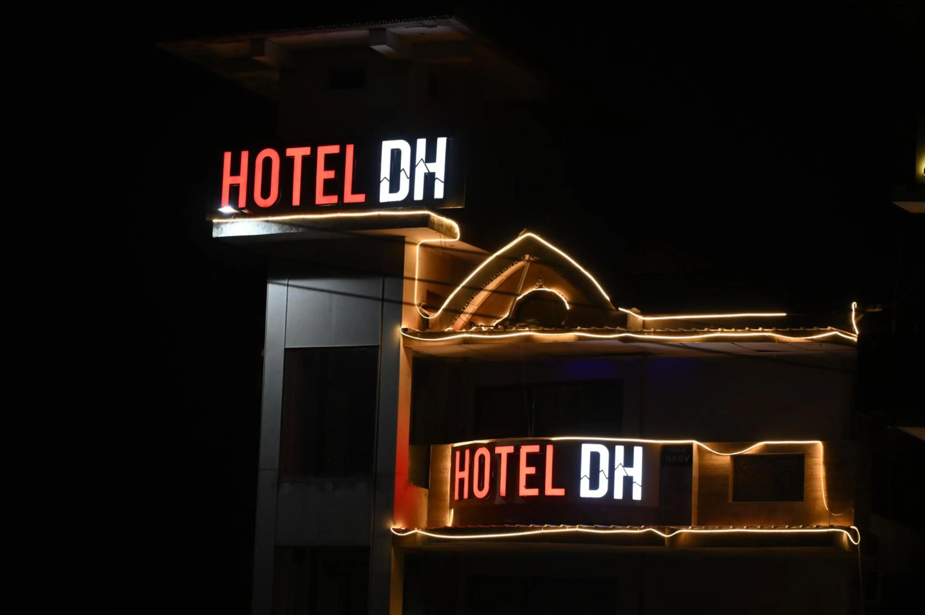 Property logo or sign in Hotel DH