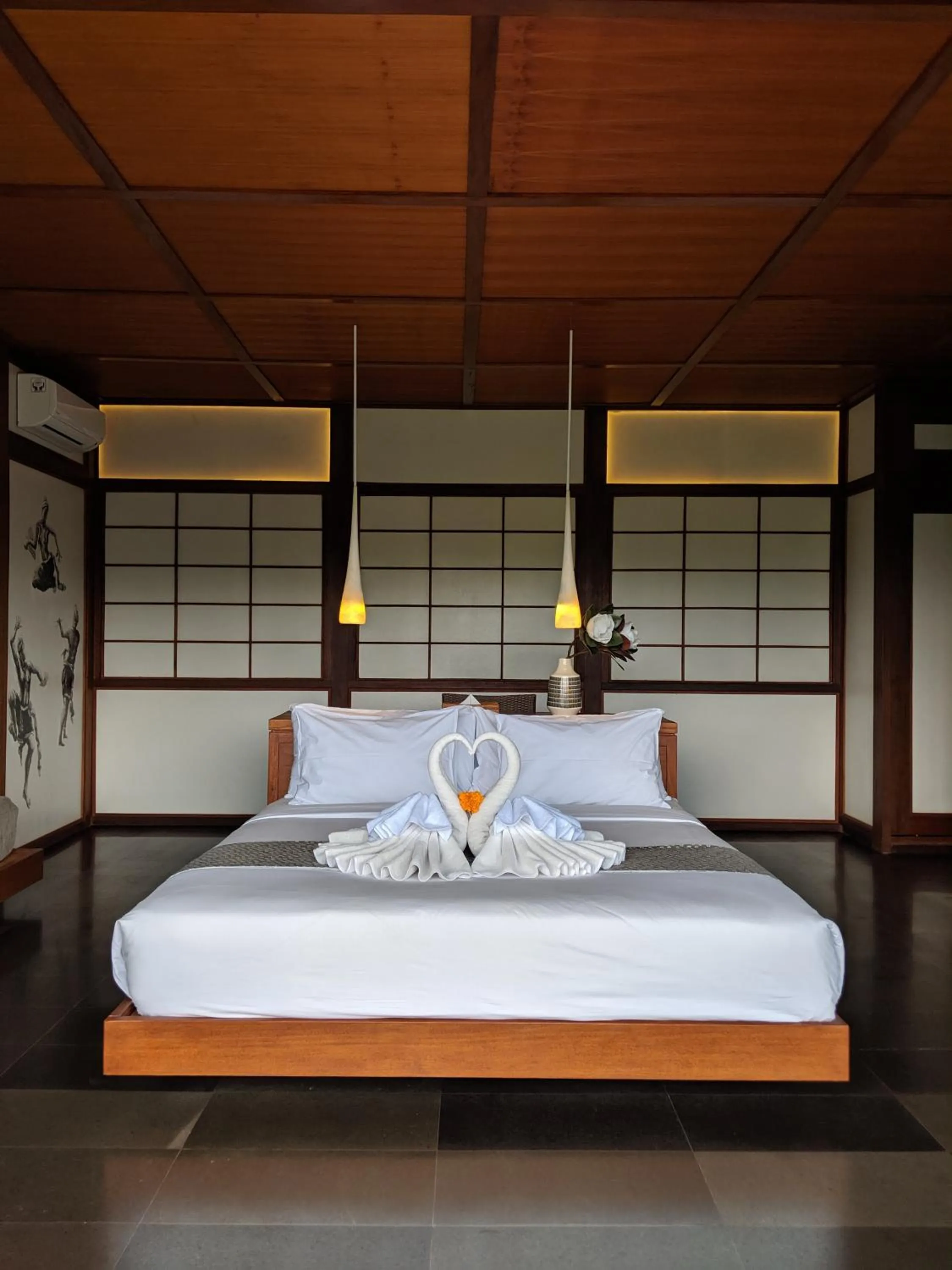 Bed in Suarapura Resort & Spa