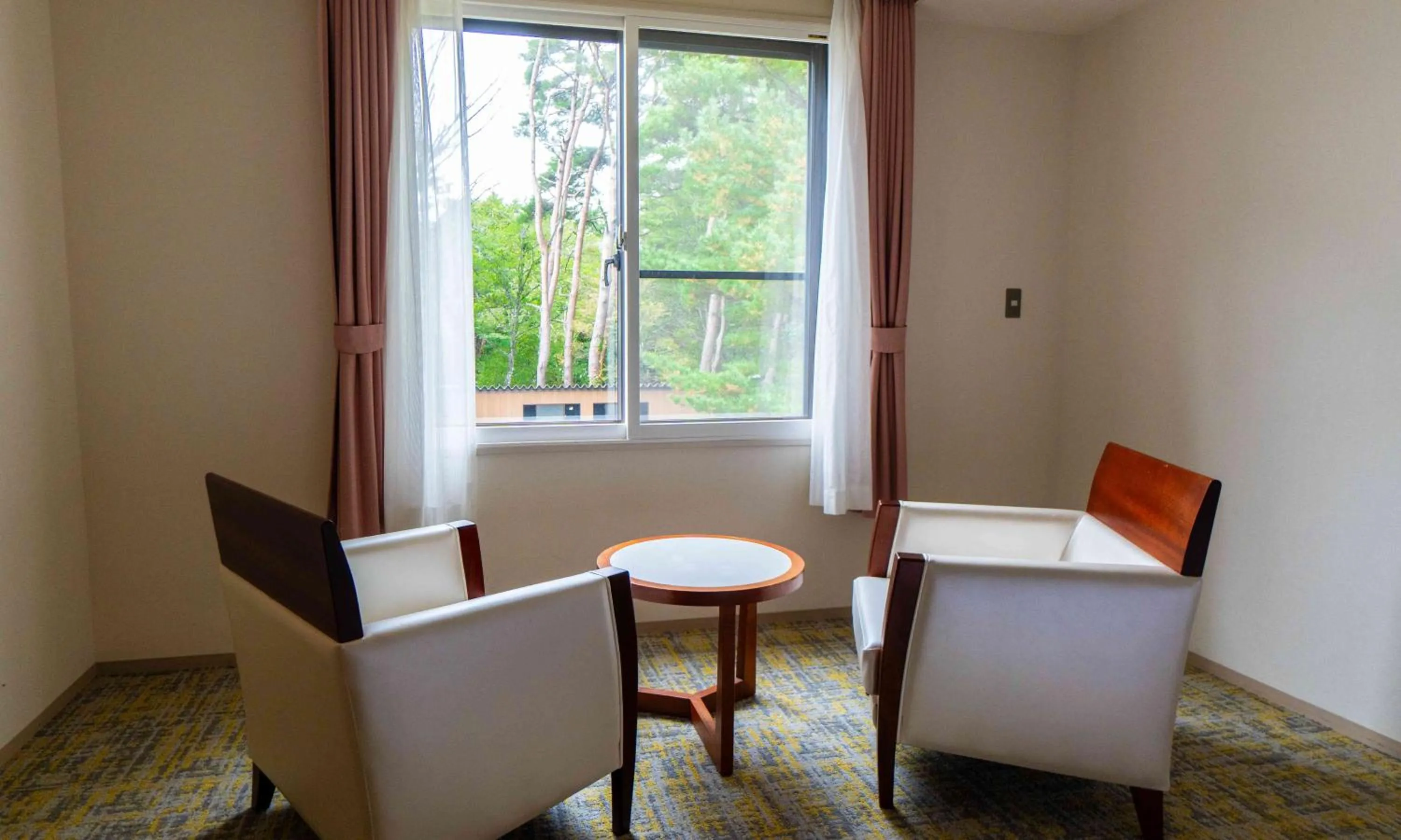 Seating area in Motosu Phoenix Hotel