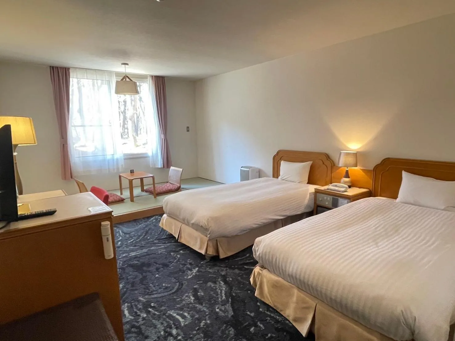 Bed in Motosu Phoenix Hotel