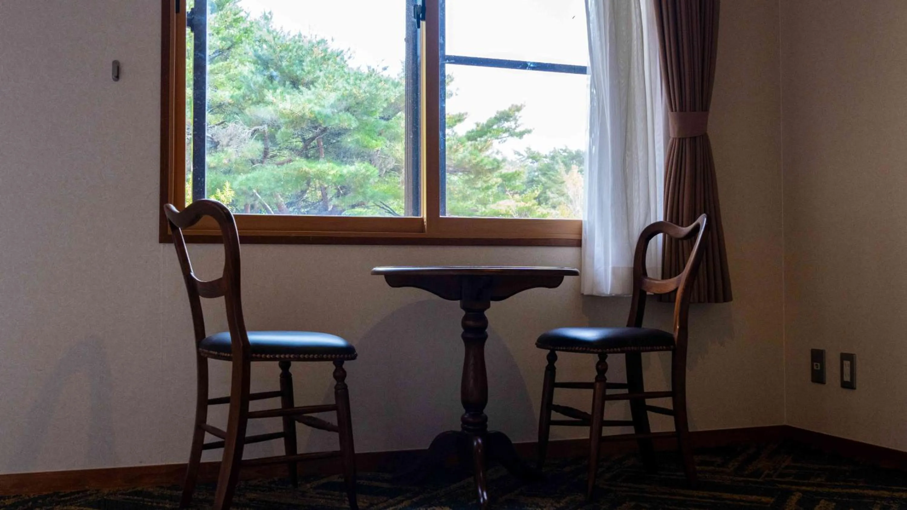 Seating area in Motosu Phoenix Hotel