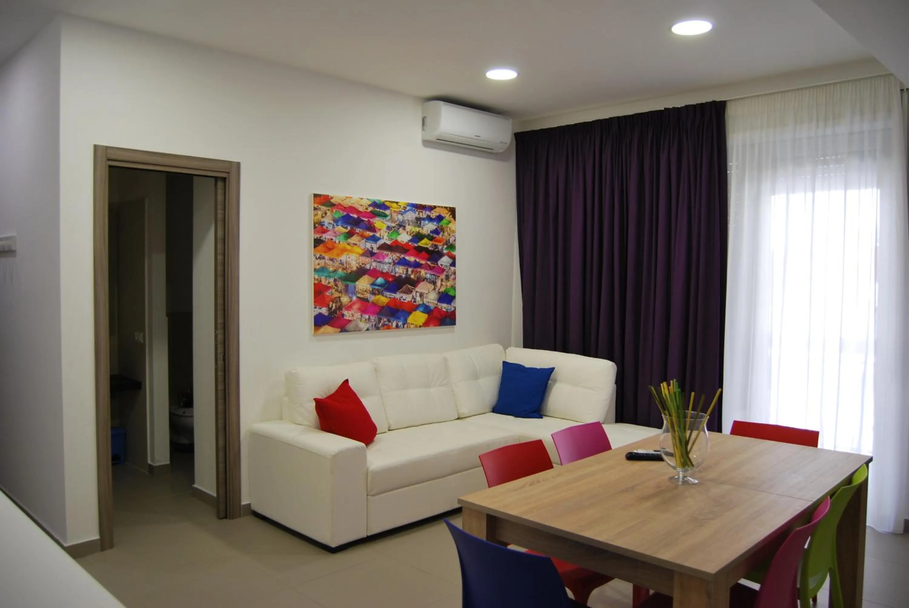 Living room in Residence Palazzo dei Delfini by RECEPTIO