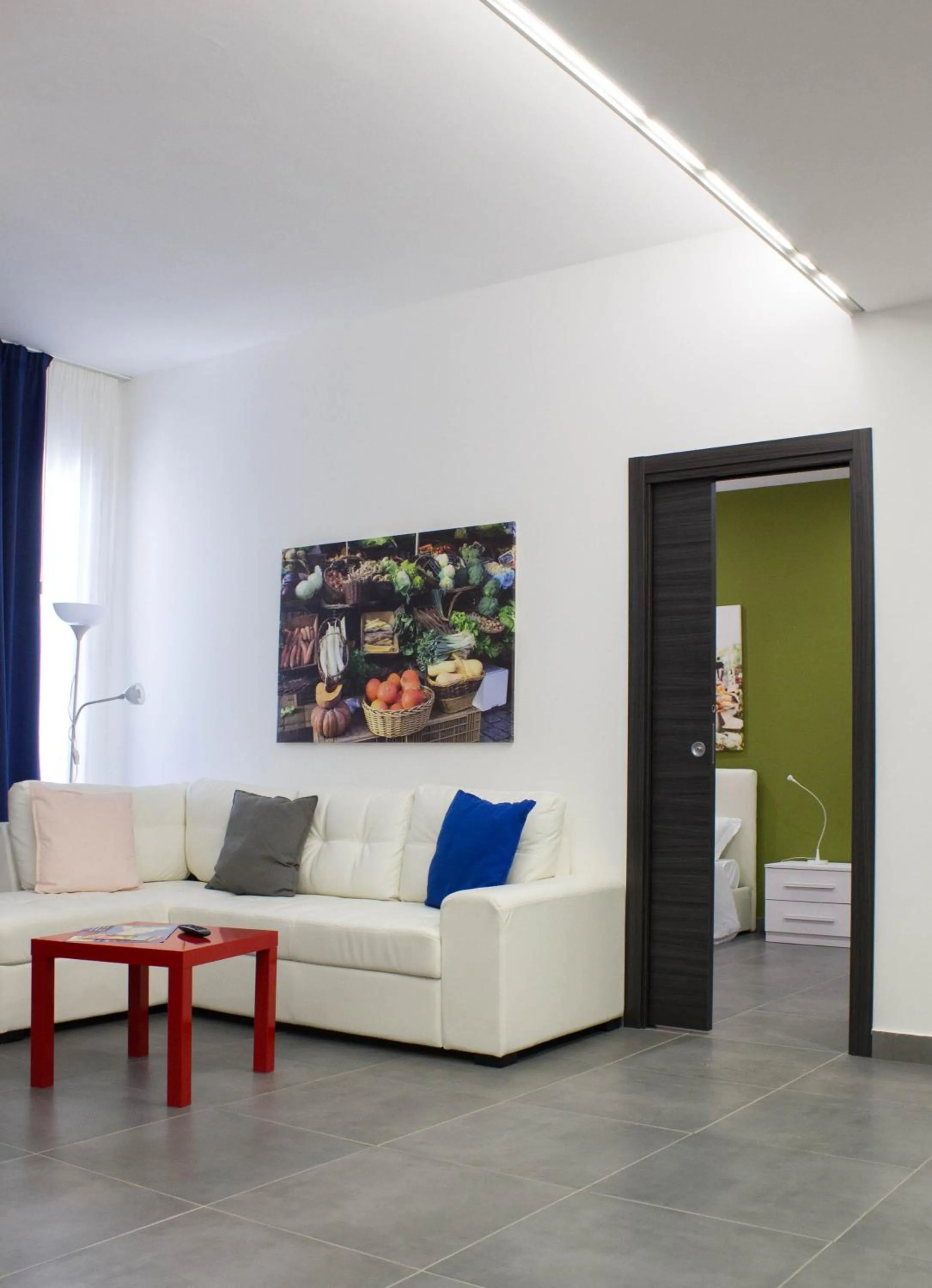 Living room in Residence Palazzo dei Delfini by RECEPTIO