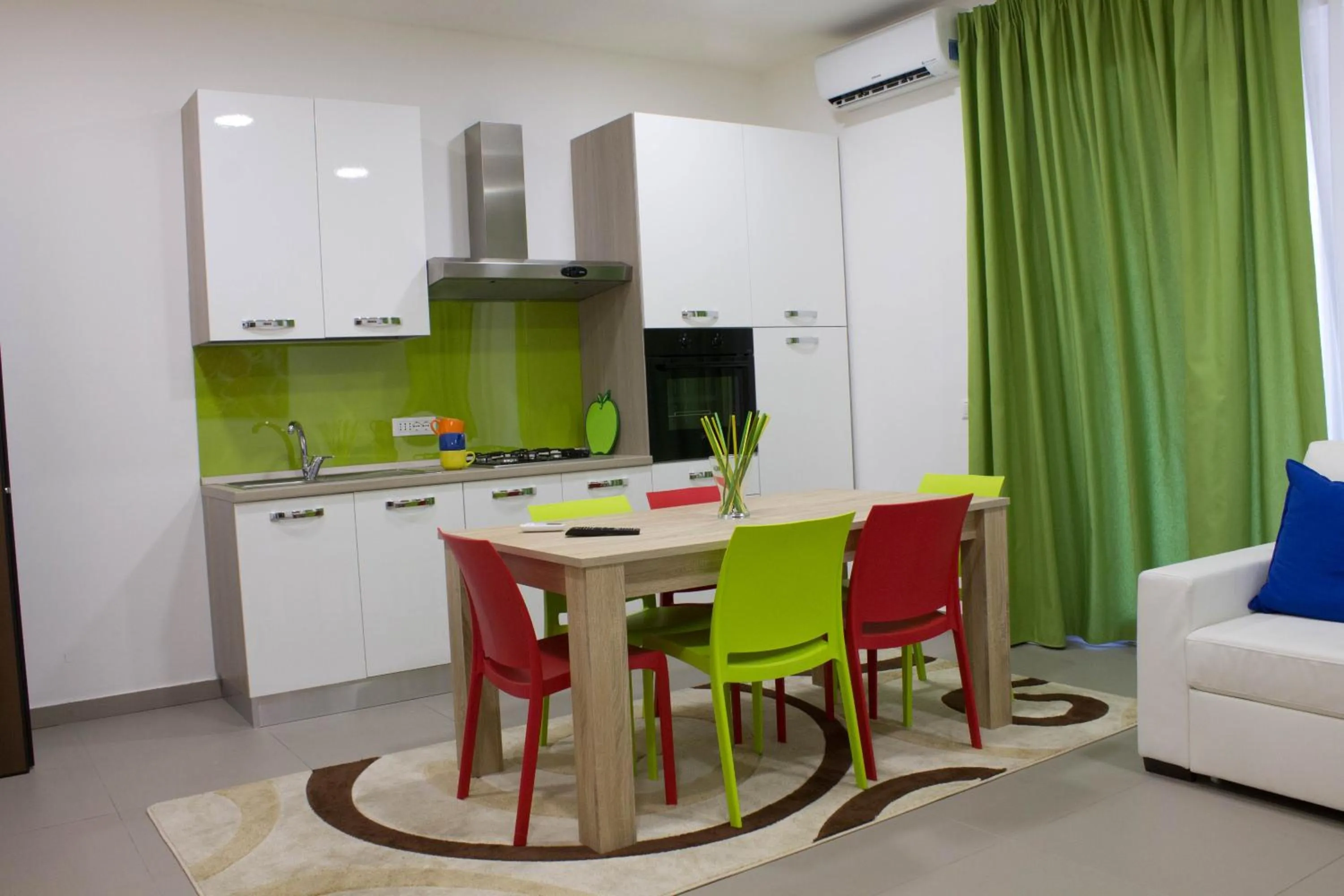 Kitchen or kitchenette in Residence Palazzo dei Delfini by RECEPTIO