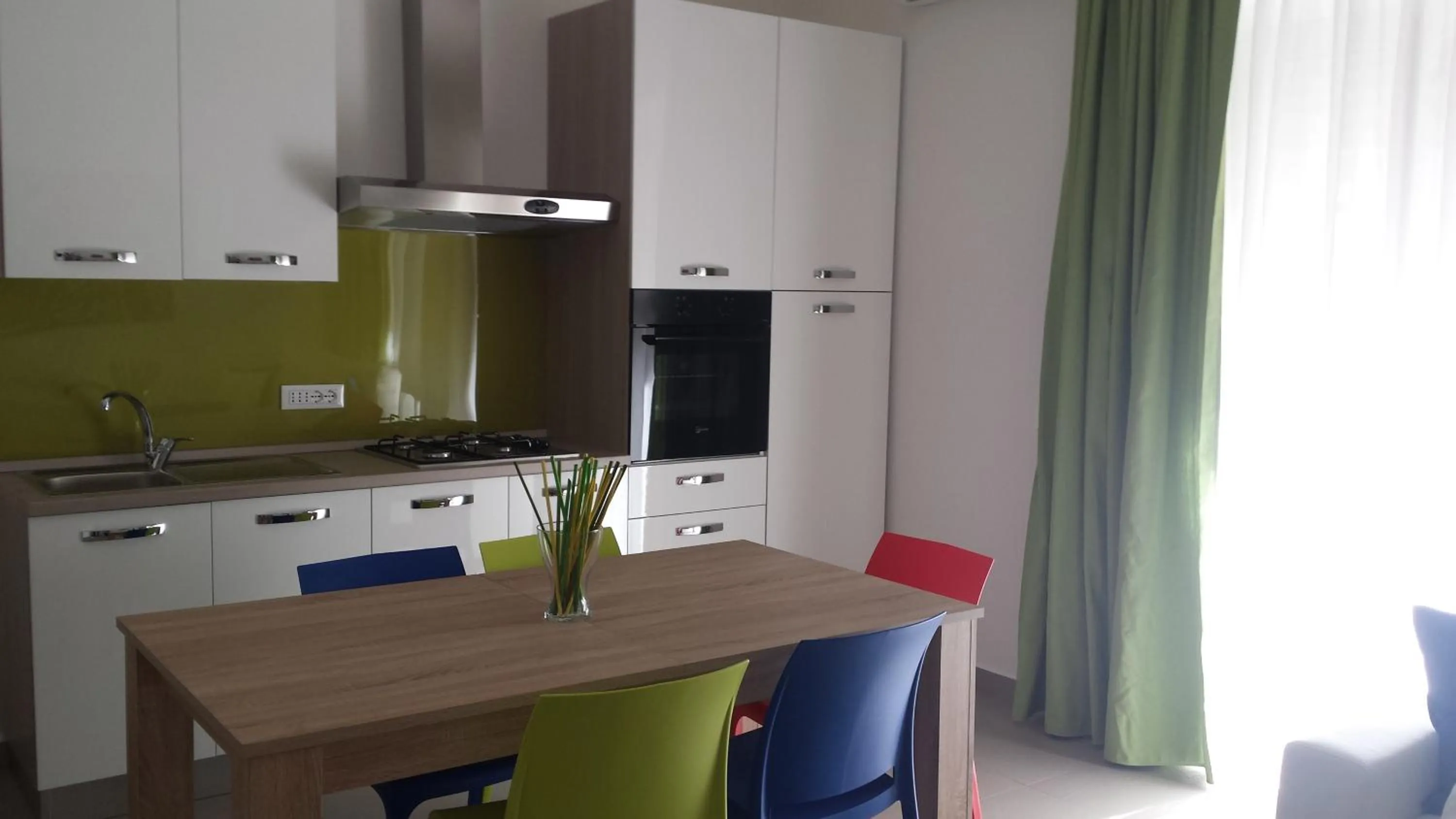 Kitchen or kitchenette in Residence Palazzo dei Delfini by RECEPTIO